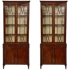 Pair of English Mahogany Book Cases with glass doors and leather writing surface