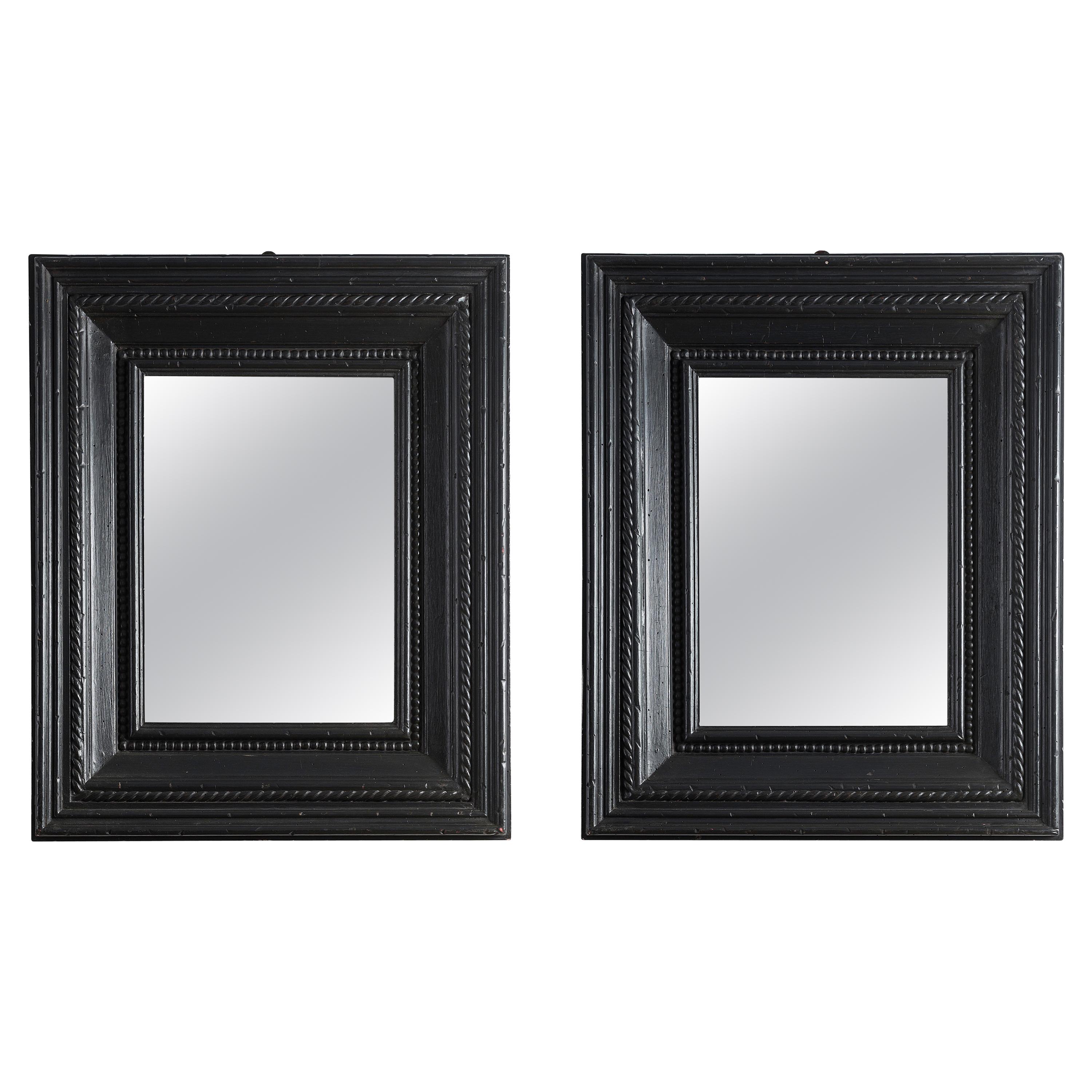 Elegant Pair of Flemish Ebonized Mirrors