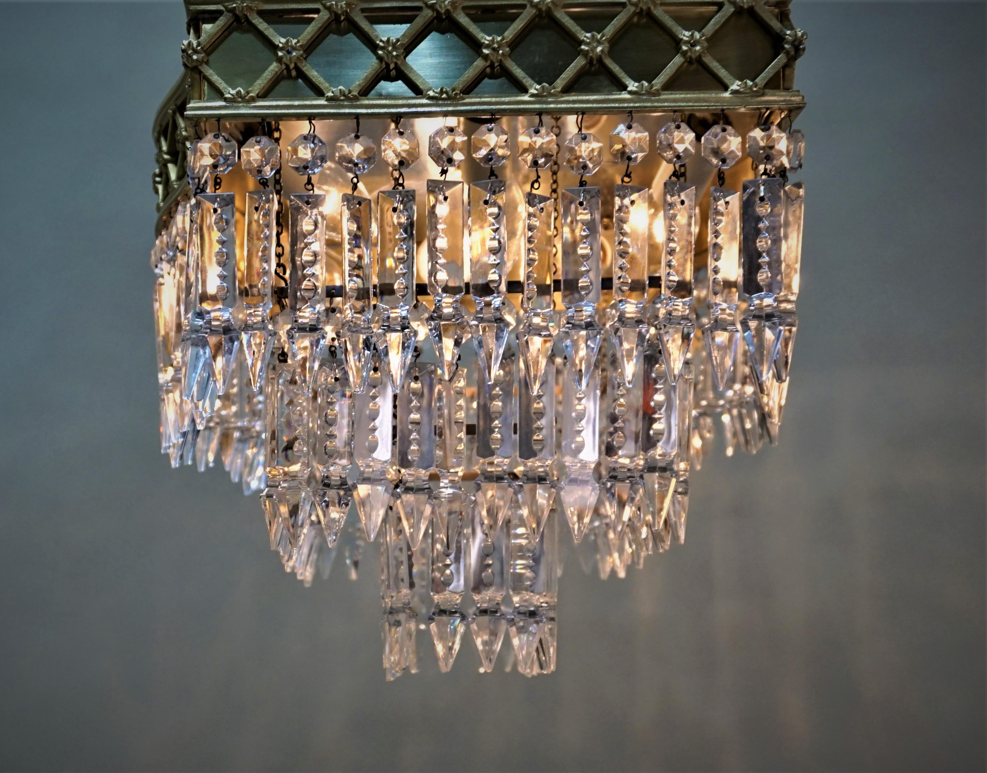 Mid-20th Century Elegant Pair of Flush Mount Crystal and Bronze Chandeliers
