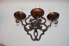 Elegant pair of French 1920's wrought iron sconces