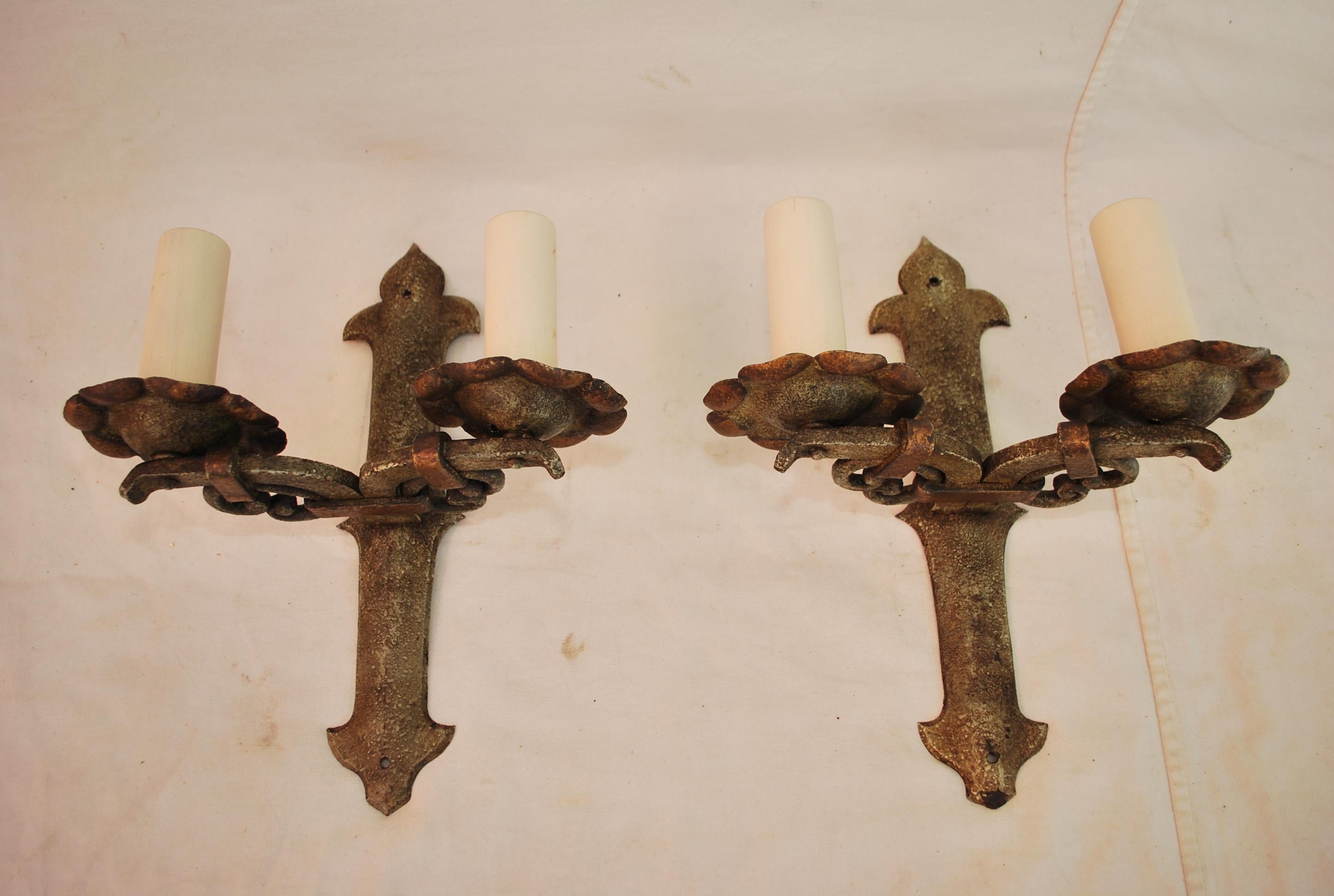 Hammered Elegant Pair of French 1920's Wrought Iron Sconces For Sale