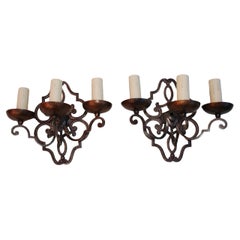 Elegant pair of French 1920's wrought iron sconces
