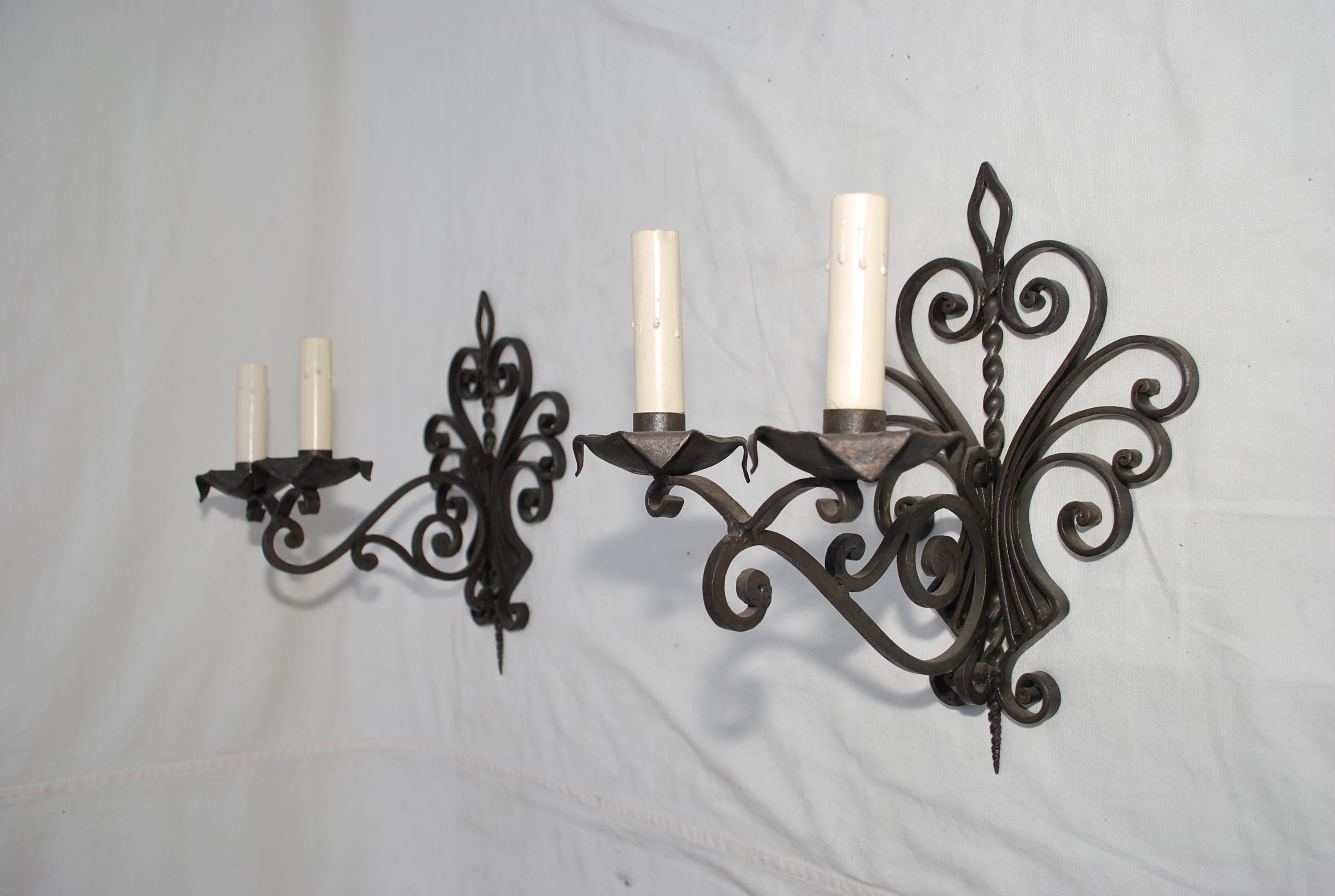 Mid-20th Century Elegant pair of French 1930's wrought iron sconces For Sale