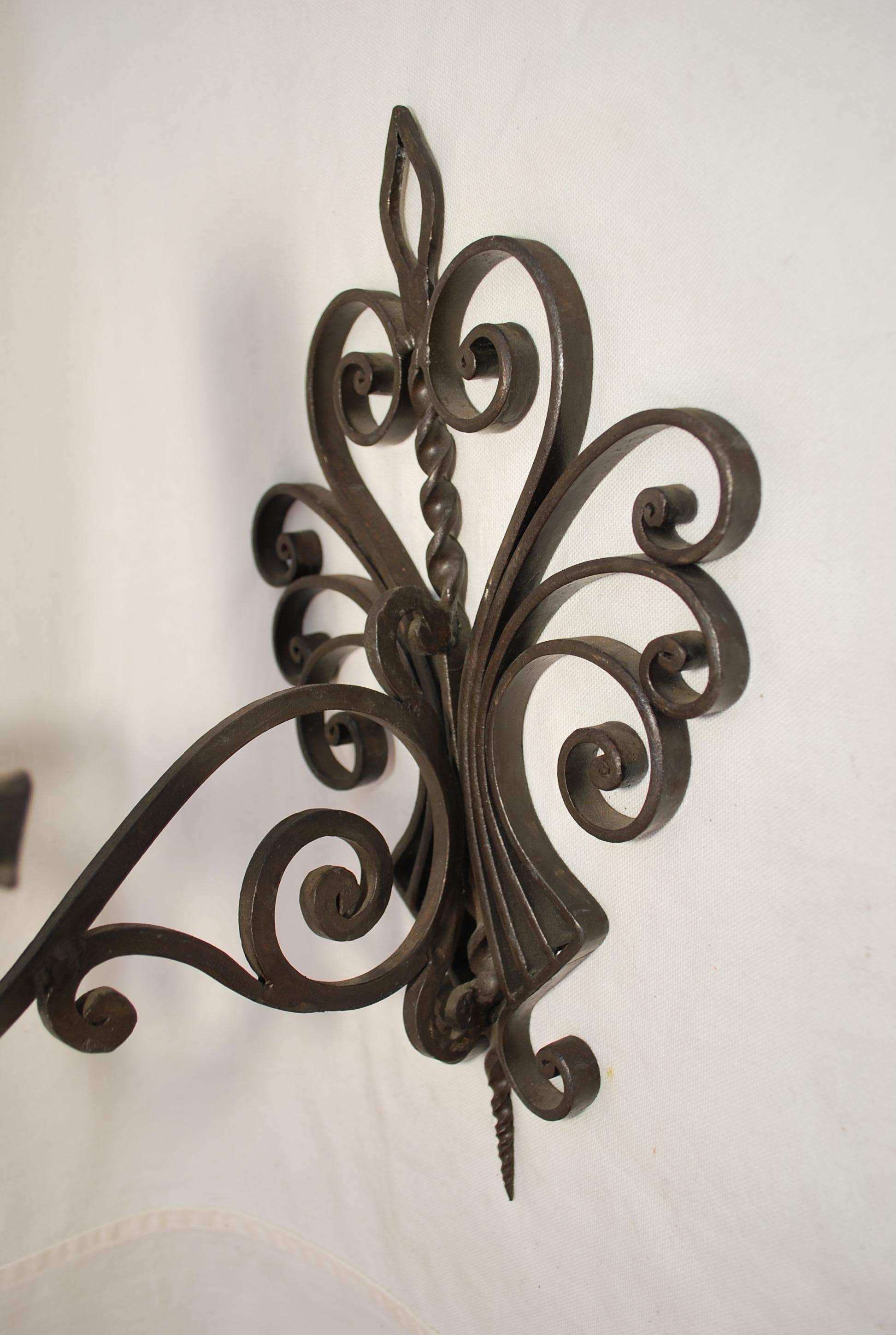 Wrought Iron Elegant pair of French 1930's wrought iron sconces For Sale