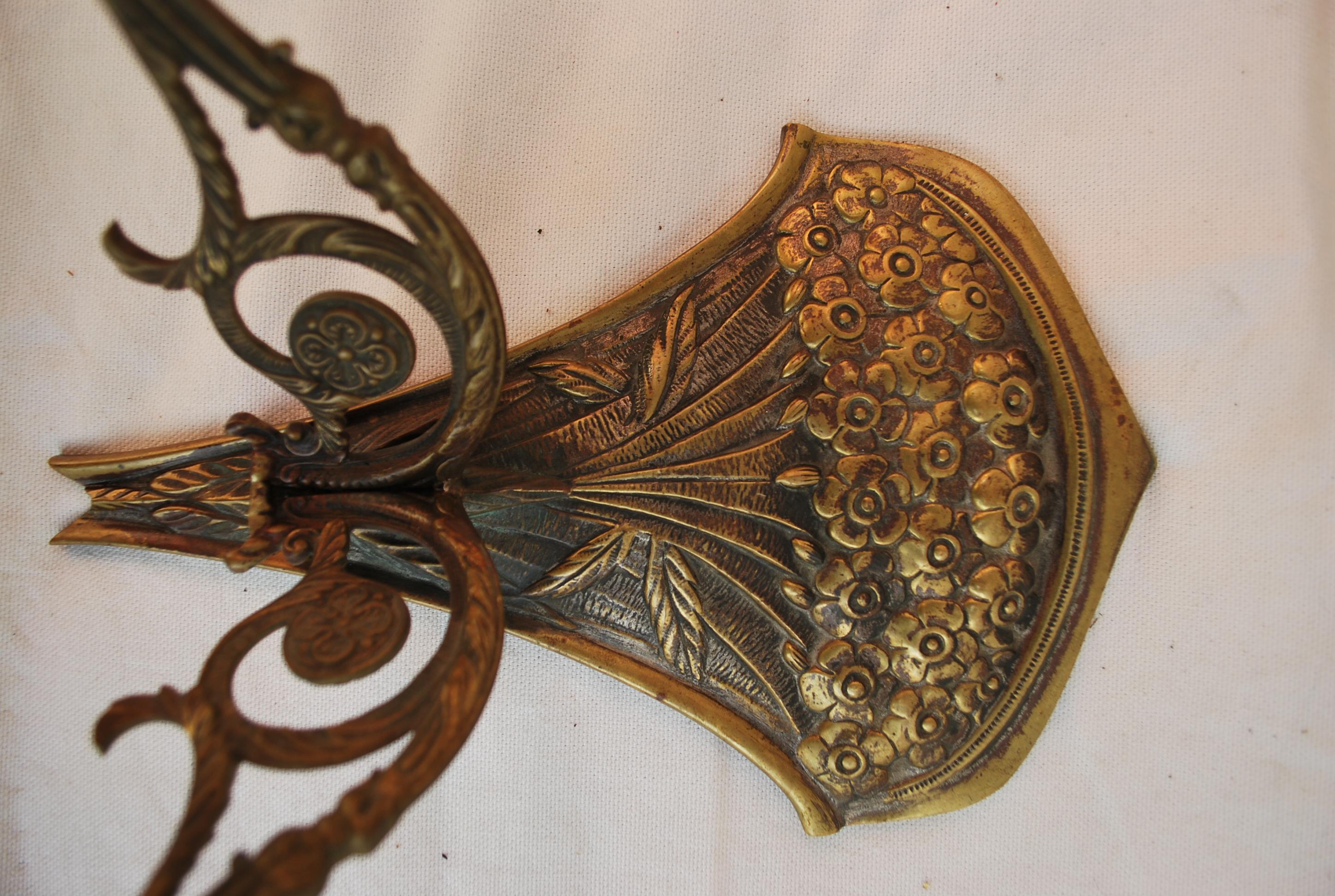 A beautiful pair of French flower sconces, the patina is allot nicer in person,