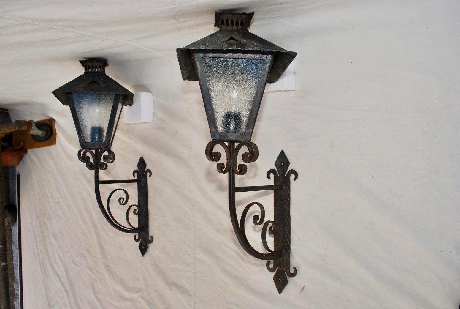 The patina is much nicer in person, the design is very unusual, I love the way they situated the light, not in front like most of the sconces, but in a different angle,.

 