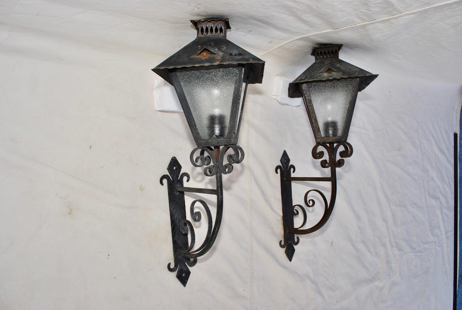 Hand-Crafted Elegant Pair of French 1940s Wrought Iron Outdoor Sconces