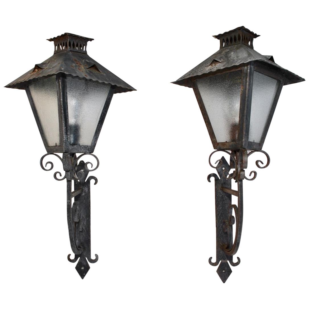 Elegant Pair of French 1940s Wrought Iron Outdoor Sconces