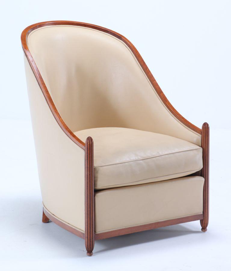 An elegant pair of French Art Deco leather club chairs in the manner of Rhulmann, circa 1930.