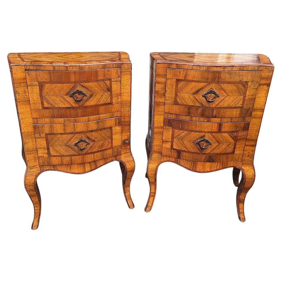 Two beautiful antique walnut curved bedside tables with two drawers.
Antique fine quality pair of Italain bedside tables cupboards with a beautiful patine. In good antique condition.
