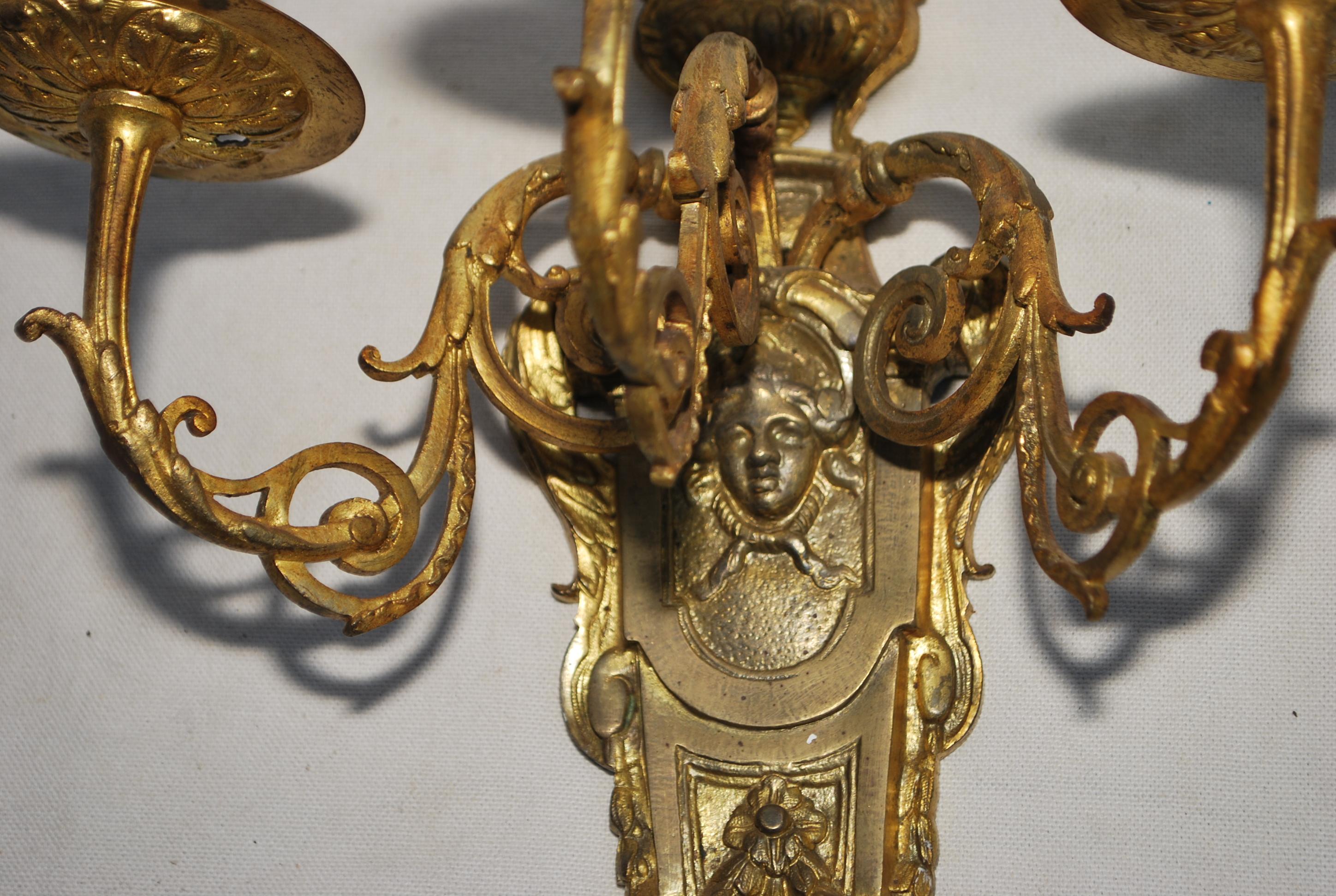 Bronze Elegant pair of French bronze sconces For Sale
