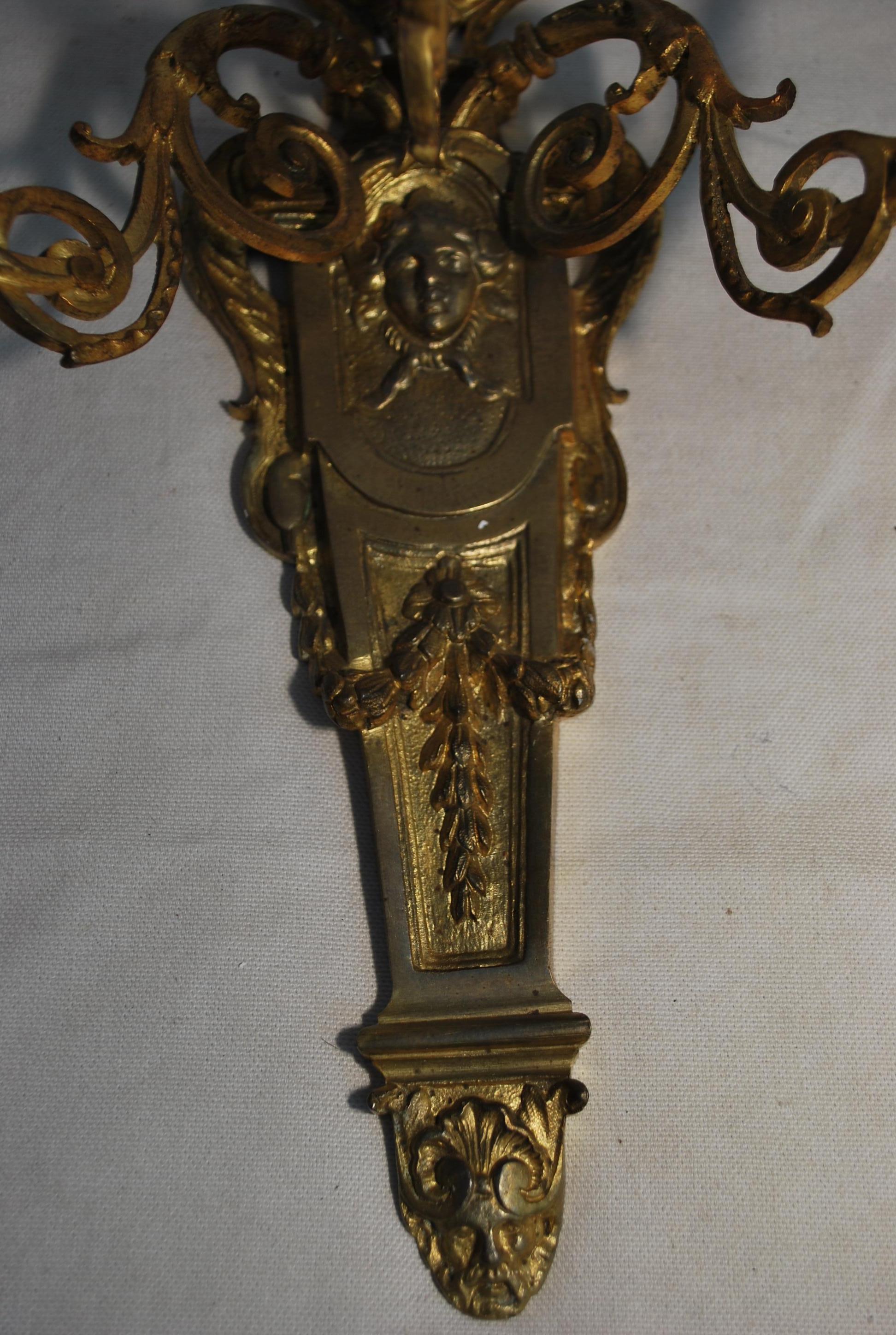 Elegant pair of French bronze sconces For Sale 1
