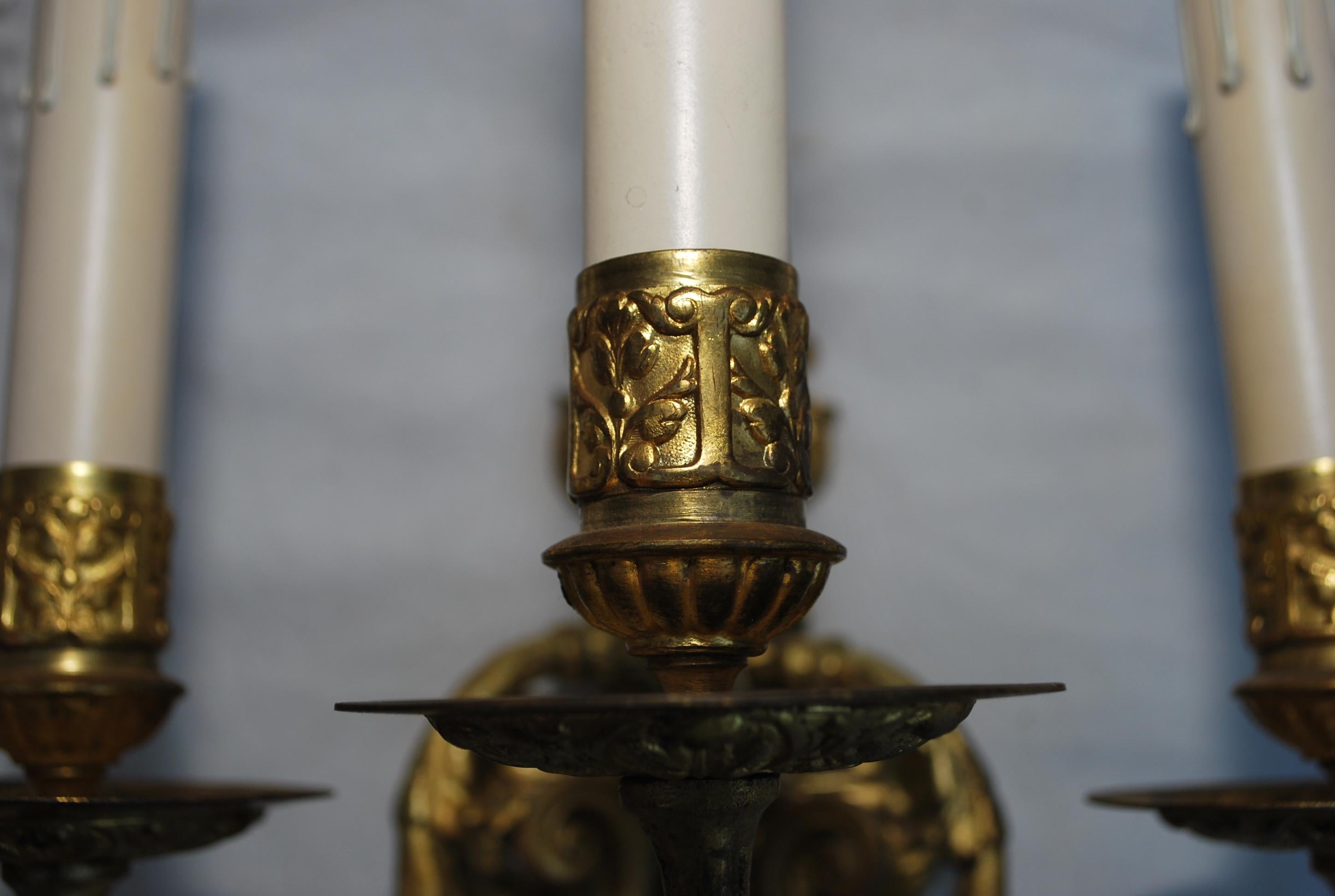 Elegant pair of French bronze sconces For Sale 2