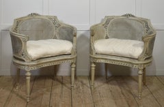 Elegant Pair of French Carved & Caned Tub Chairs In The Louis XVI Style