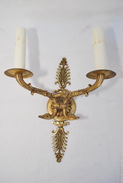 Elegant pair of French Empire style sconces
