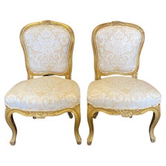 Elegantes Paar französischer Louis XV.-Sessel ohne Armlehne aus Gold