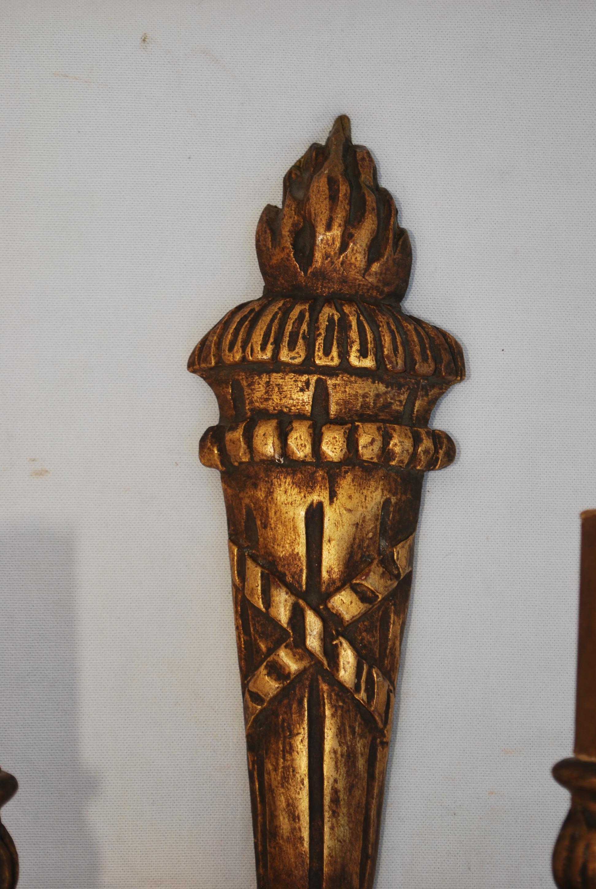 An elegant pair of French wood sconces, Empire style, the patina is much nicer in person