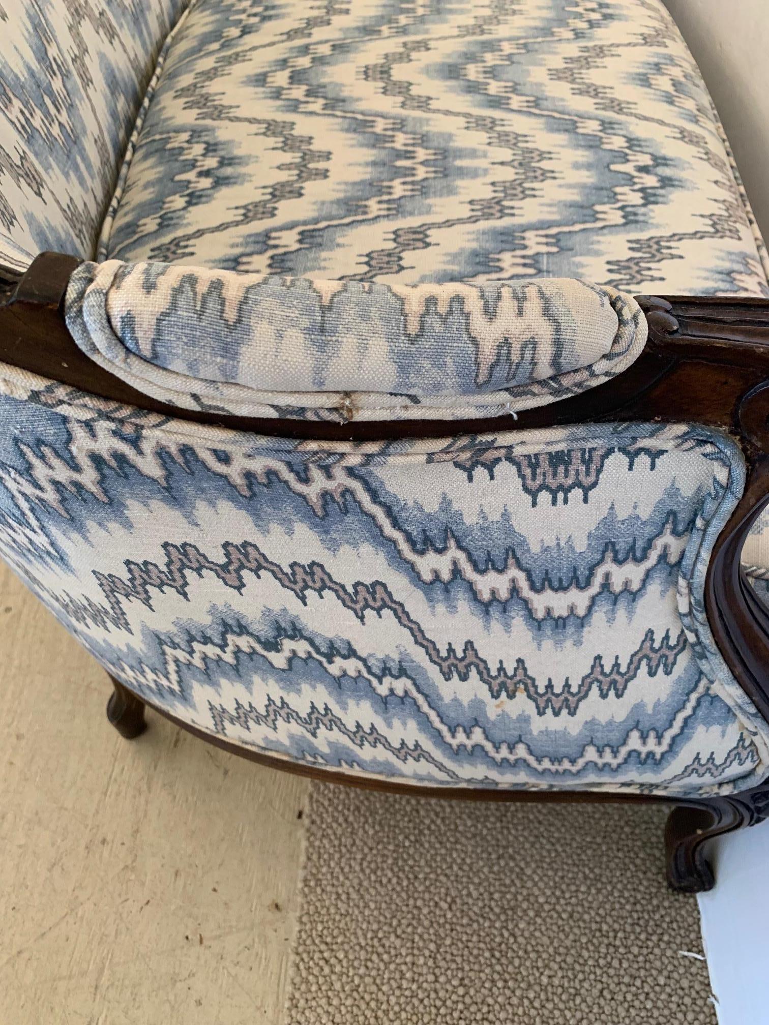 Early 20th Century Elegant Pair of French Walnut Upholstered Loveseats with Rounded Backs
