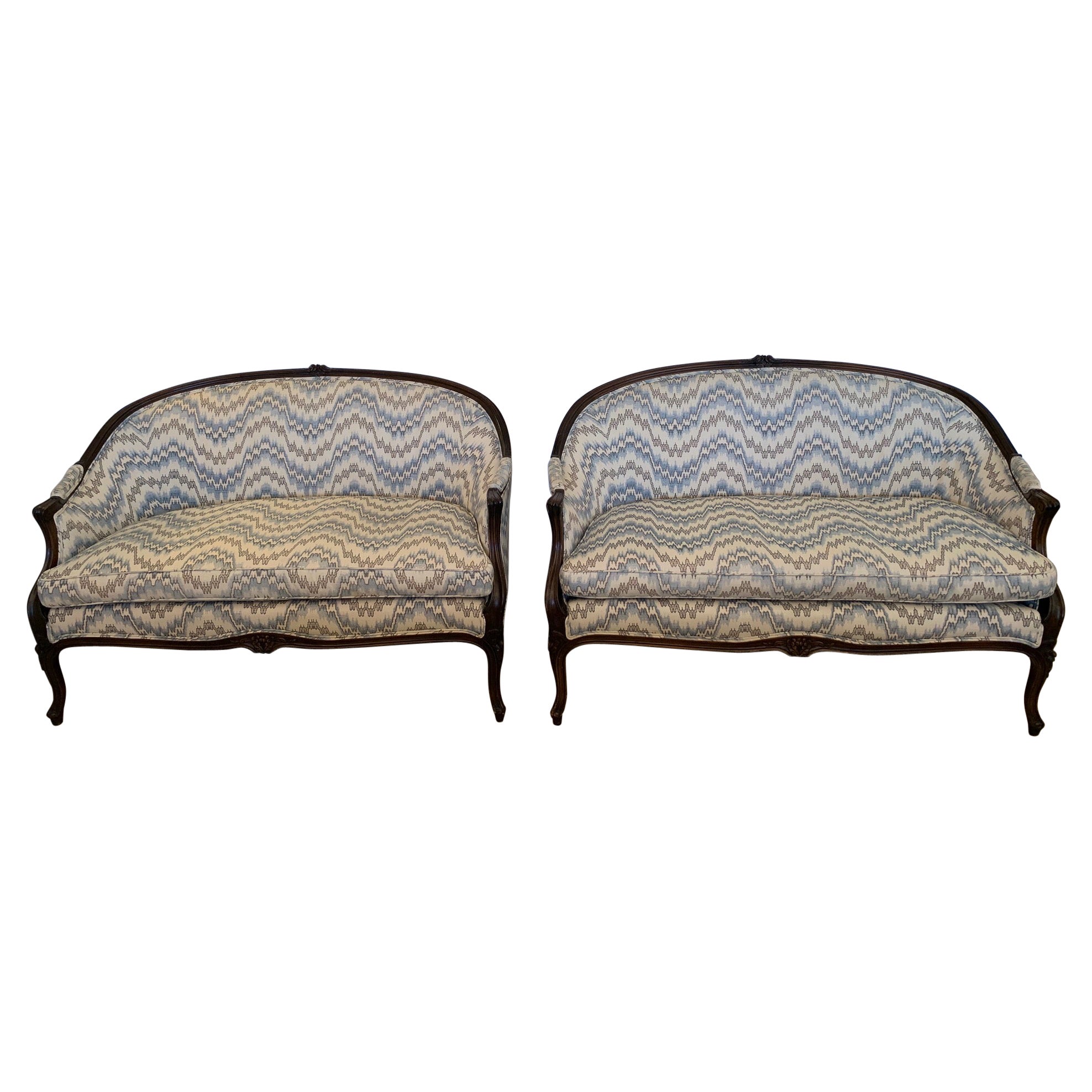 Elegant Pair of French Walnut Upholstered Loveseats with Rounded Backs