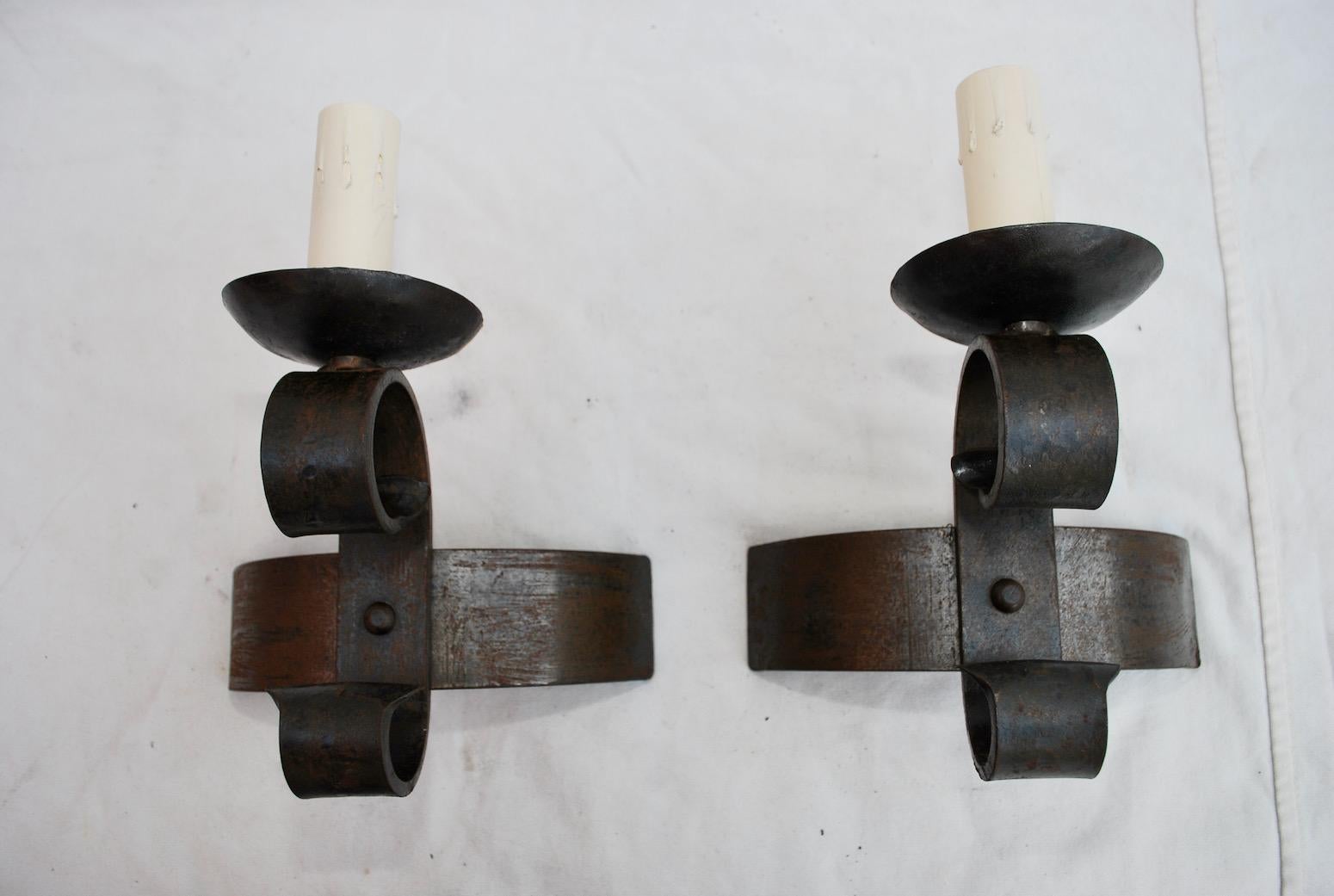 Hammered Elegant Pair of French Wrought Iron Sconces For Sale