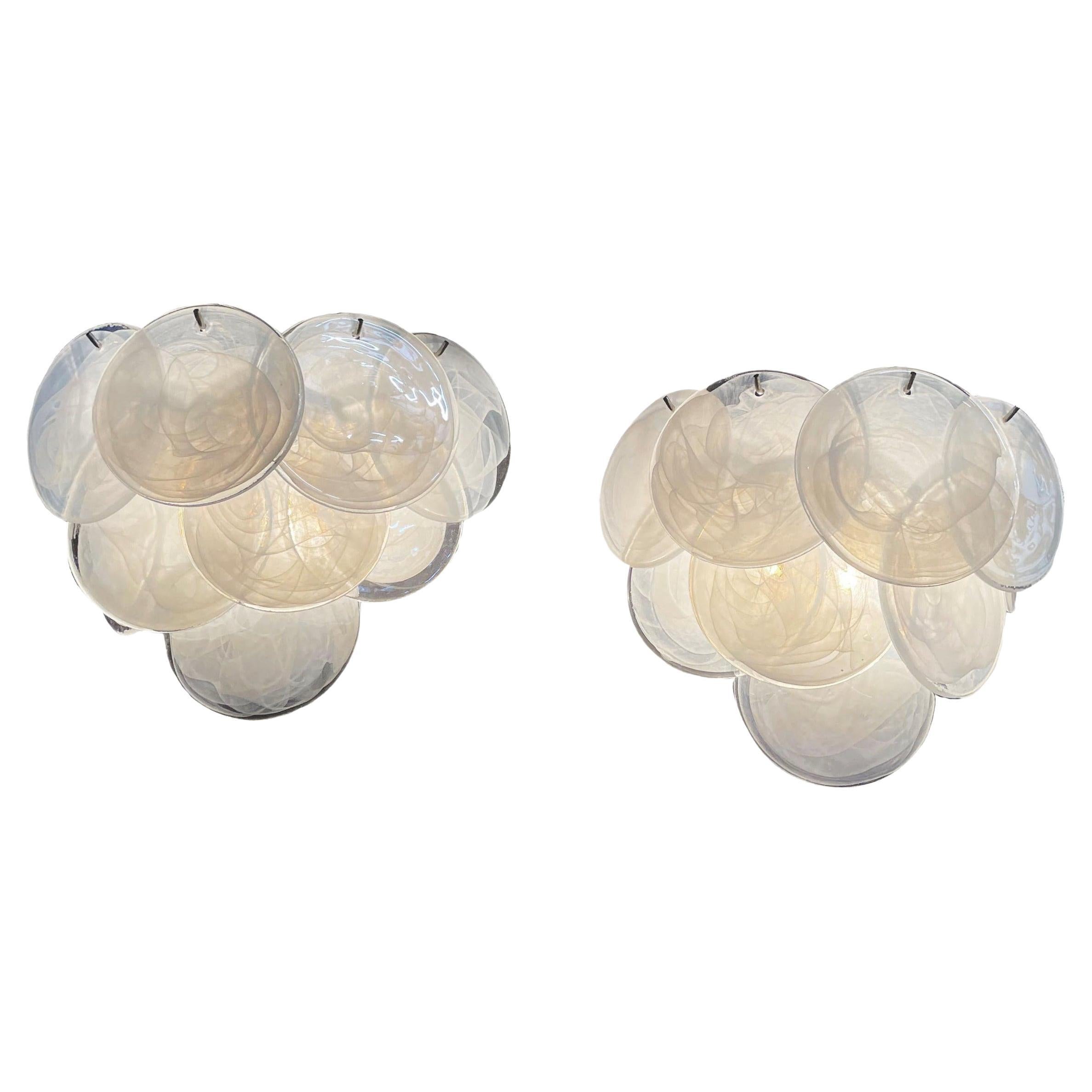Elegant Pair of glass wall sconces - 10 alabaster white disks For Sale