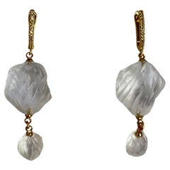 Elegant pair of hand carved recycled and refined plastic with Swarovski crystals