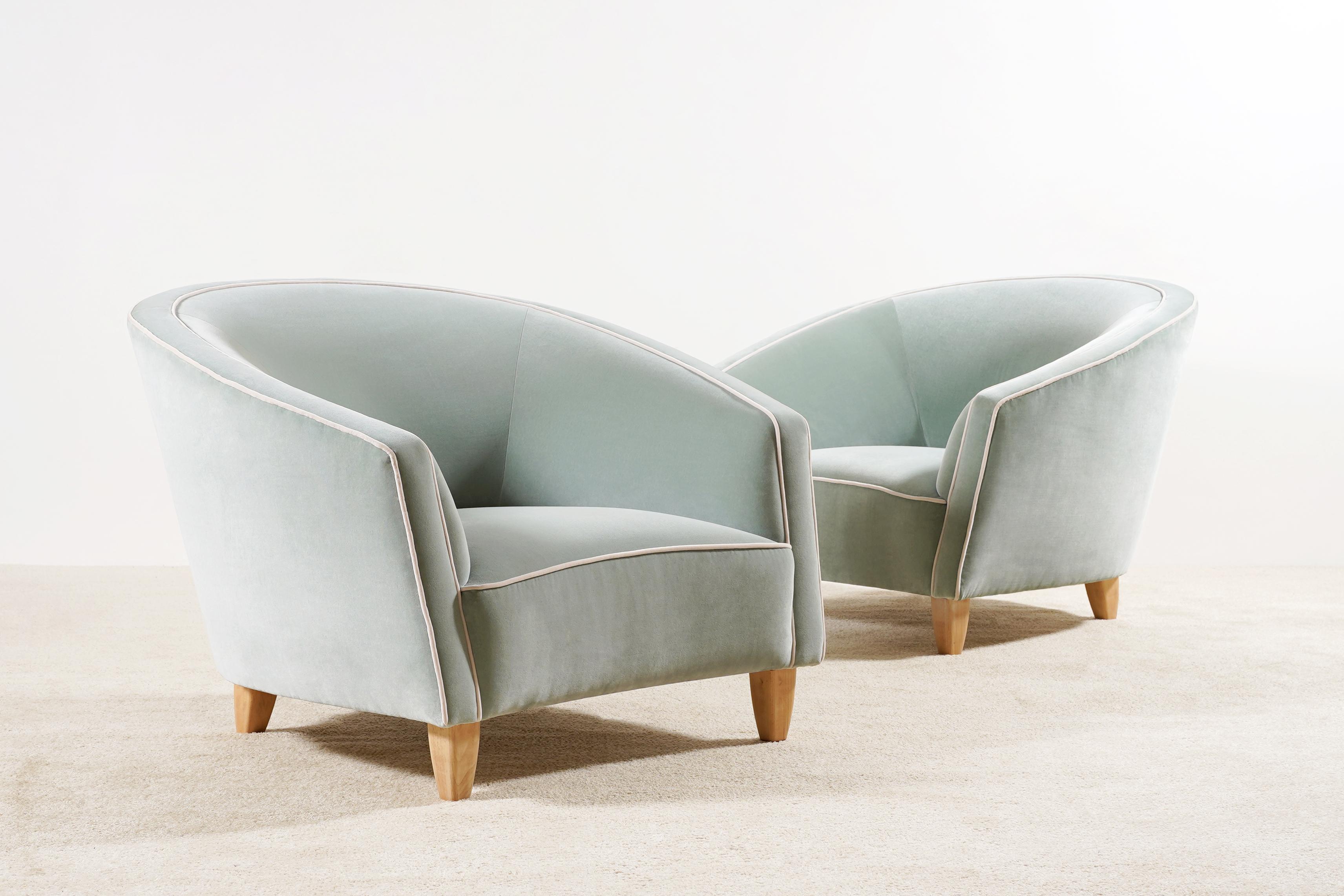 Elegant Pair of Italian Armchairs. Circa 1950/60.
Soft and comfortable seat. Light beech waxed feet.
Perfect condition.

Original pieces from the 1950s newly re-upholstered in the traditional way by the best French craftsmen, we used a high quality