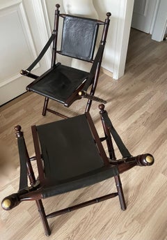 Pair of Leather and Faux-Bamboo Folding Chairs Attributed to Maison Jansen.