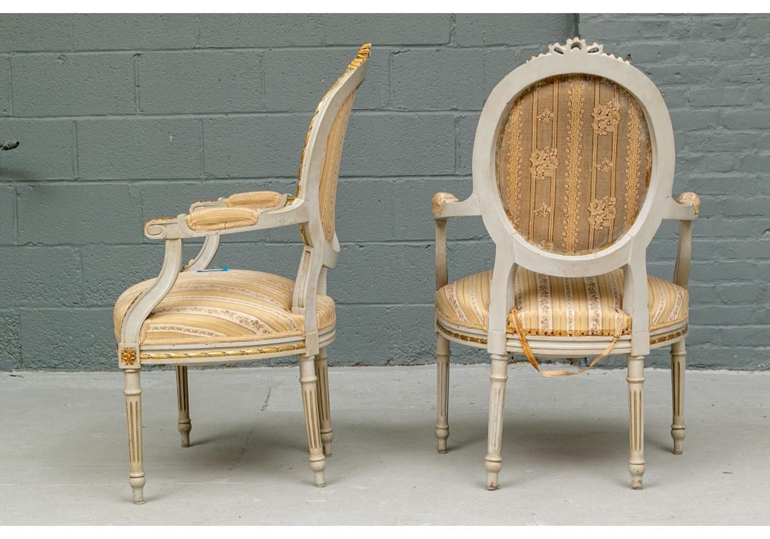 Elegant Pair of Louis XVI Style Painted and Gilt Fauteuils 9