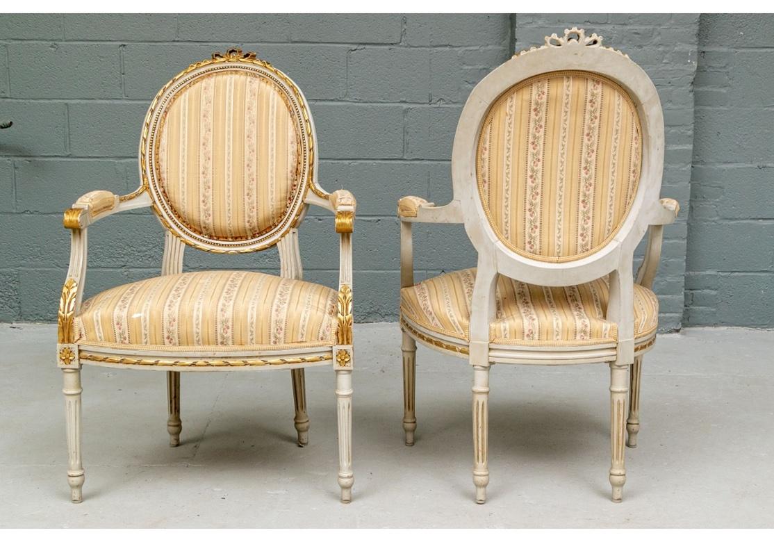 Elegant Pair of Louis XVI Style Painted and Gilt Fauteuils 3