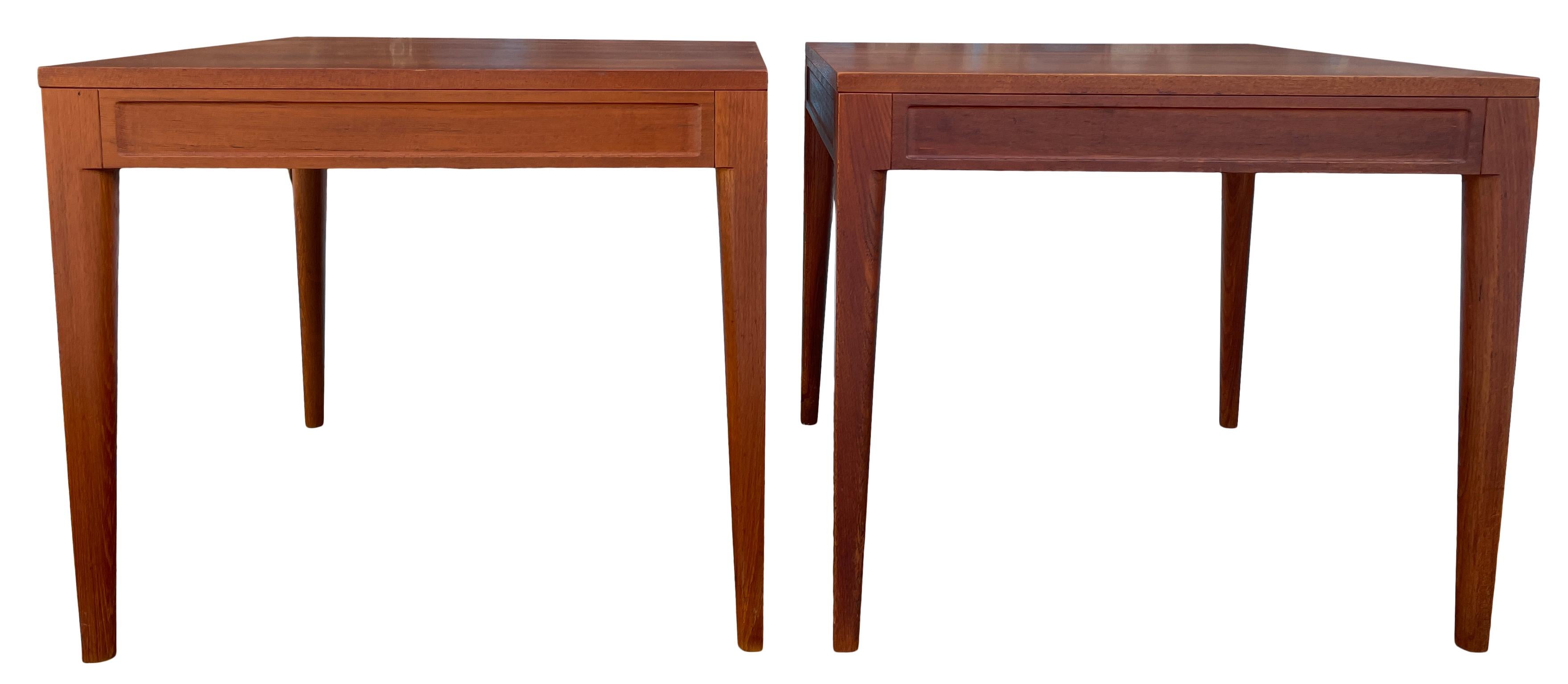 Elegant matching pair of Mid-Century Modern teak side tables or nightstands by France & Son. High Quality construction Teak side tables or nightstands.Solid teak and Brass screws - beautiful condition. Located in Brooklyn nyc

Both labeled made in