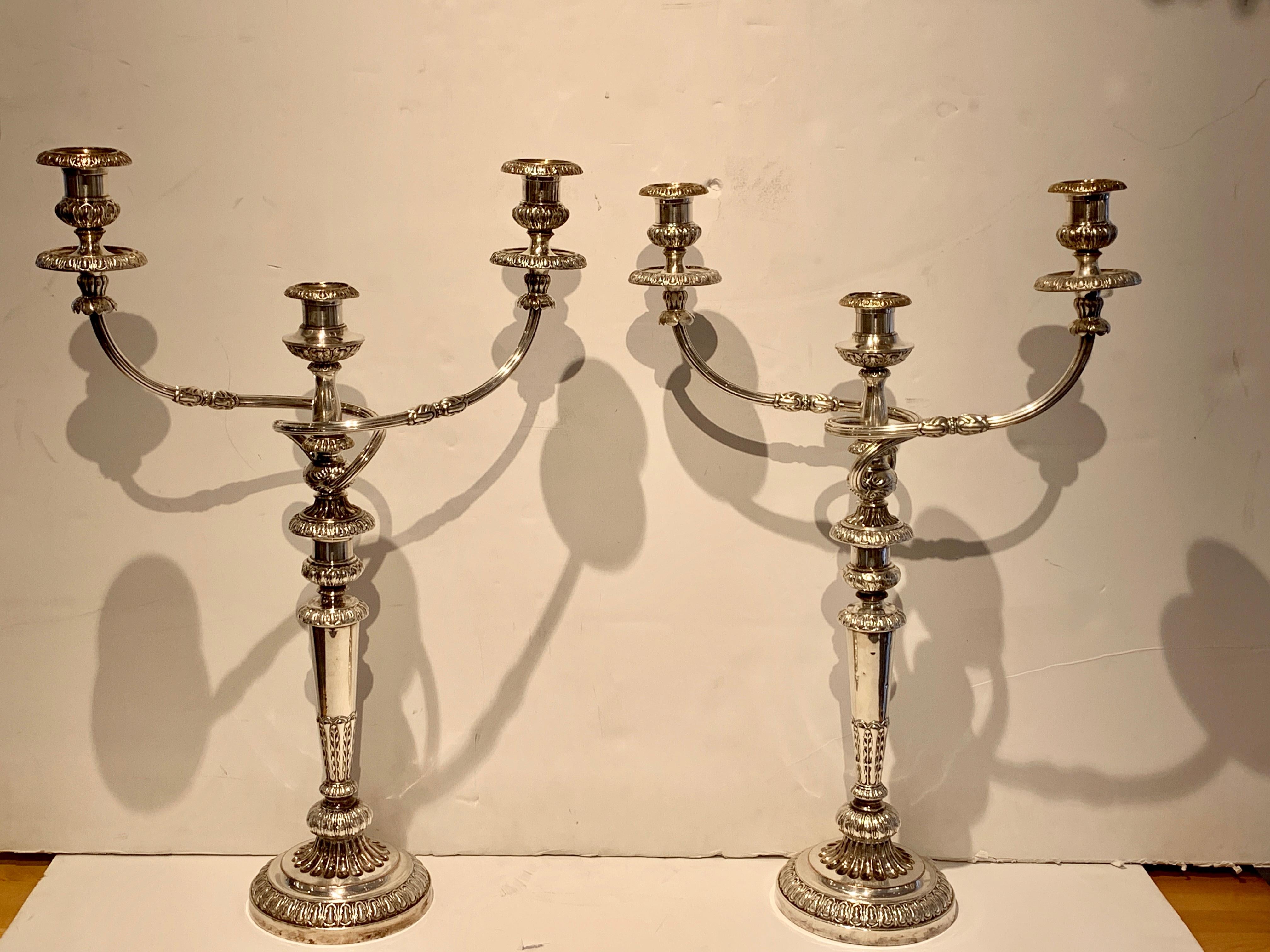 Elegant pair of old Sheffield plate candelabra, circa 1830, each one with removable three-light candelabra, fitted with bobeches, with two candle heights 22