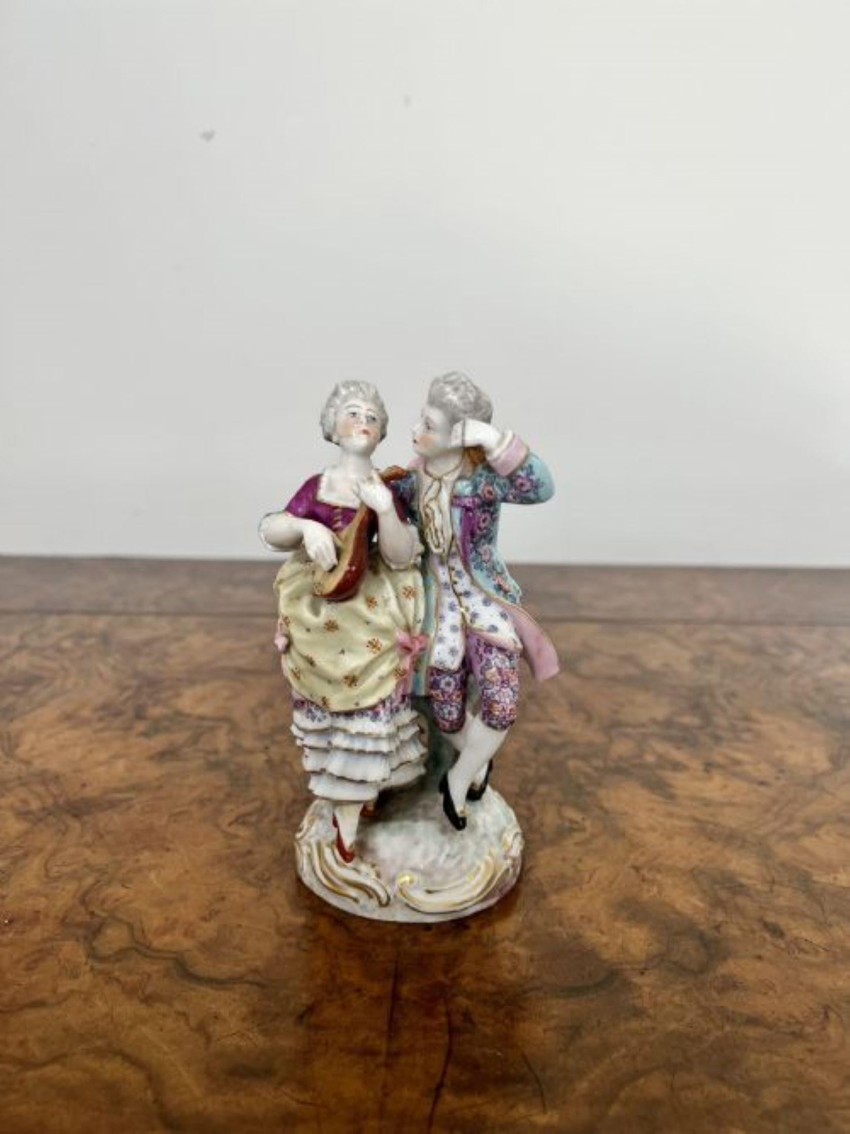 Elegant pair of quality antique 19th century porcelain Meissen figurines of two ladies and two gentlemen dancing and playing musical instruments, dressed in period clothing in wonderful hand painted colours, standing on circular shaped bases of
