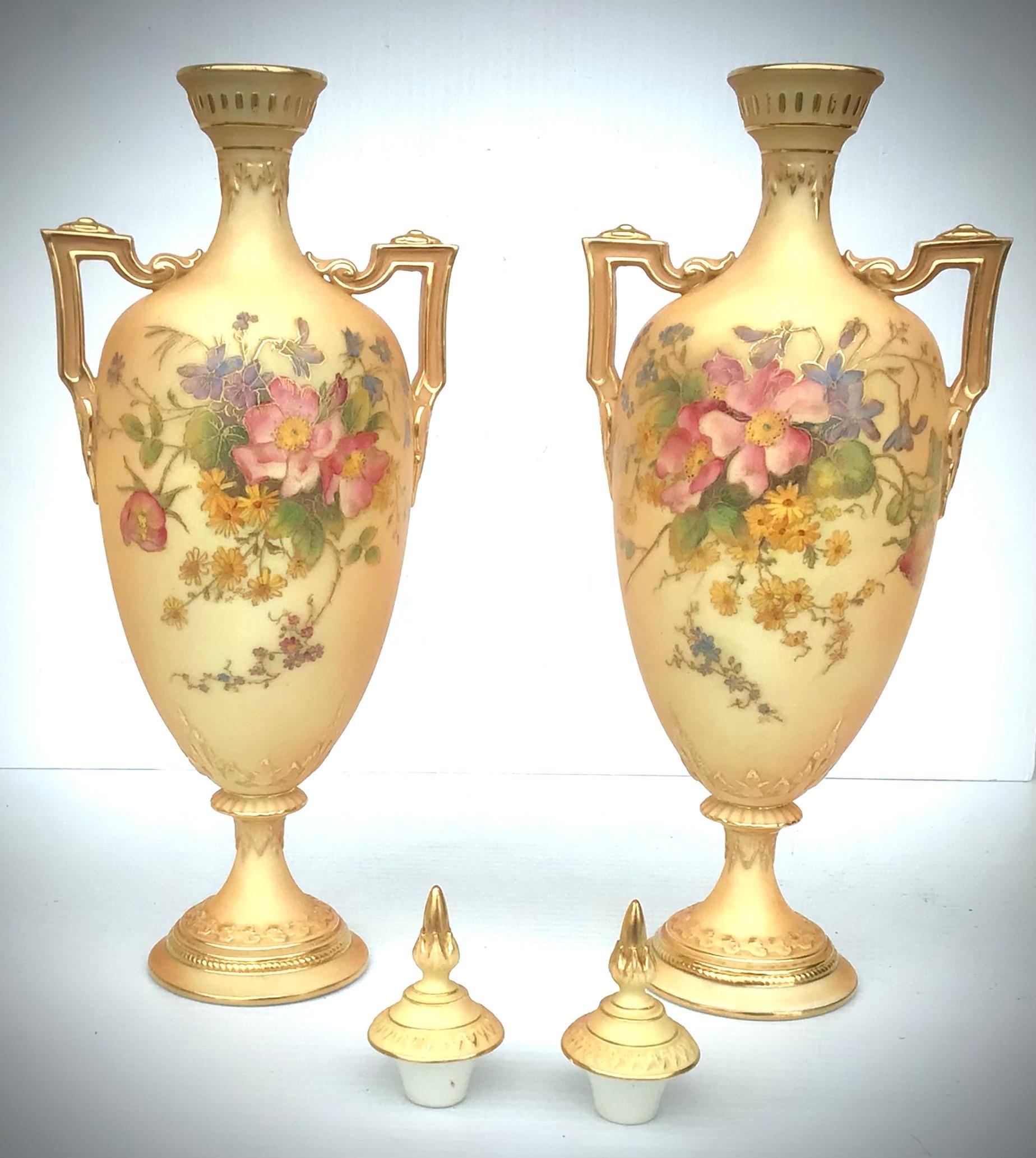 Superb pair of Royal Worcester blush ivory vases, complete with covers.
Hand painted with flowers and foliage.
Circa 1912(Green and puce marks)
12 ins tall x 4.5 ins wide x 3.5 ins deep.
Excellent original condition.