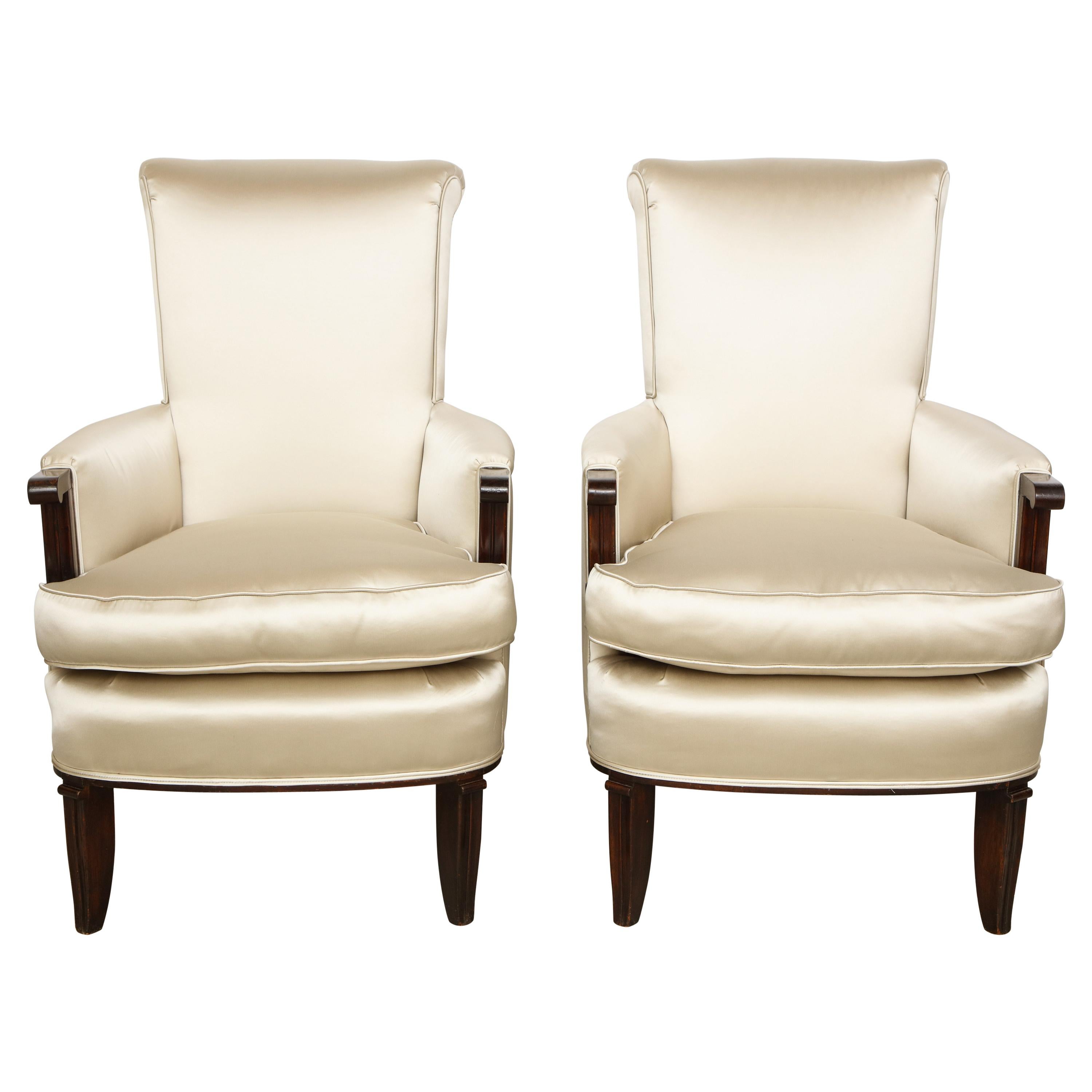 Elegant pair of satin and walnut armchairs by Jules Leleu.
Stamped: 