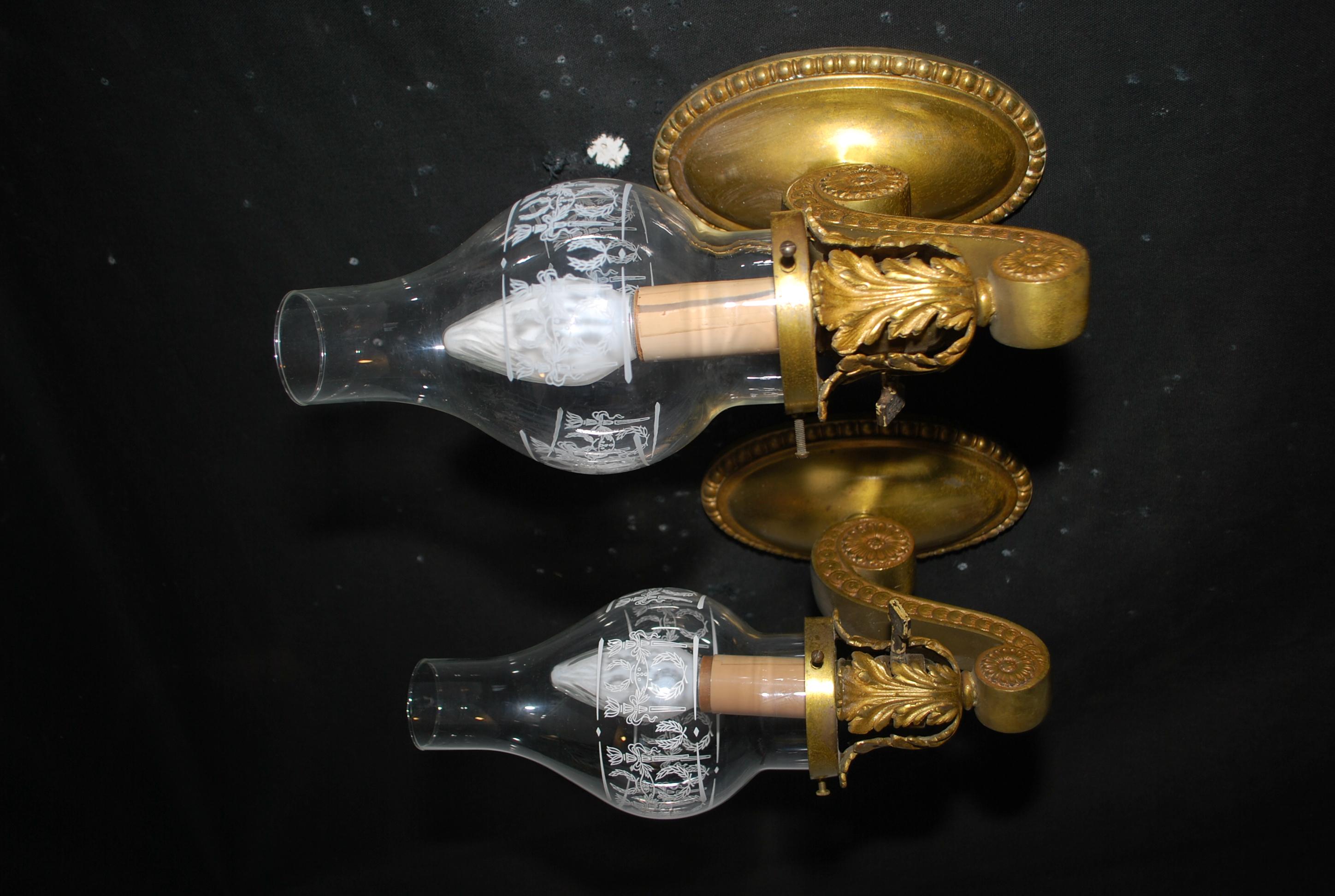 A beautiful pair of turn of the Century brass sconces, the patina is so much nicer in person.