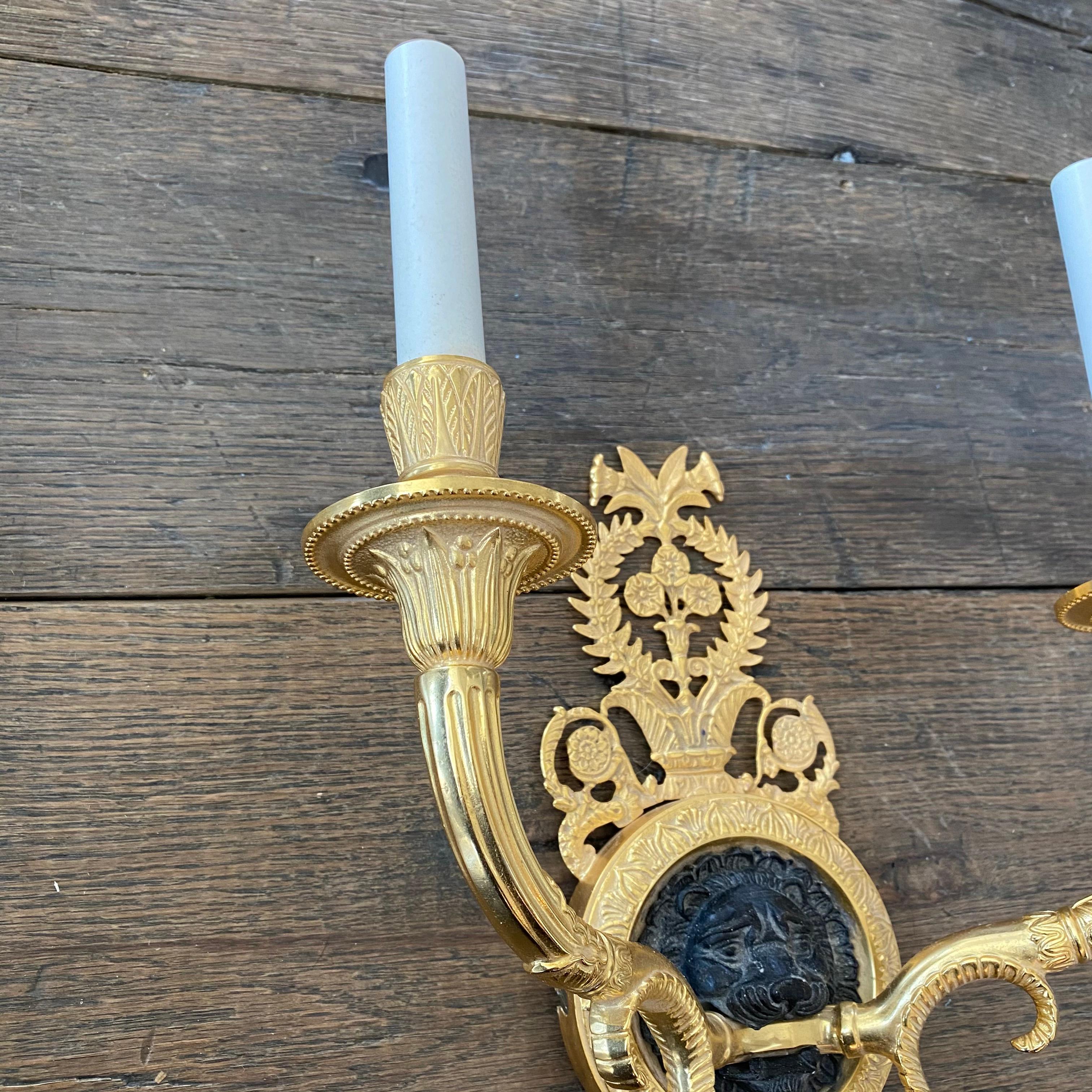 Mid-20th Century Elegant Pair of Two Arm French Empire Style Brass Wall Sconces with Lions Heads