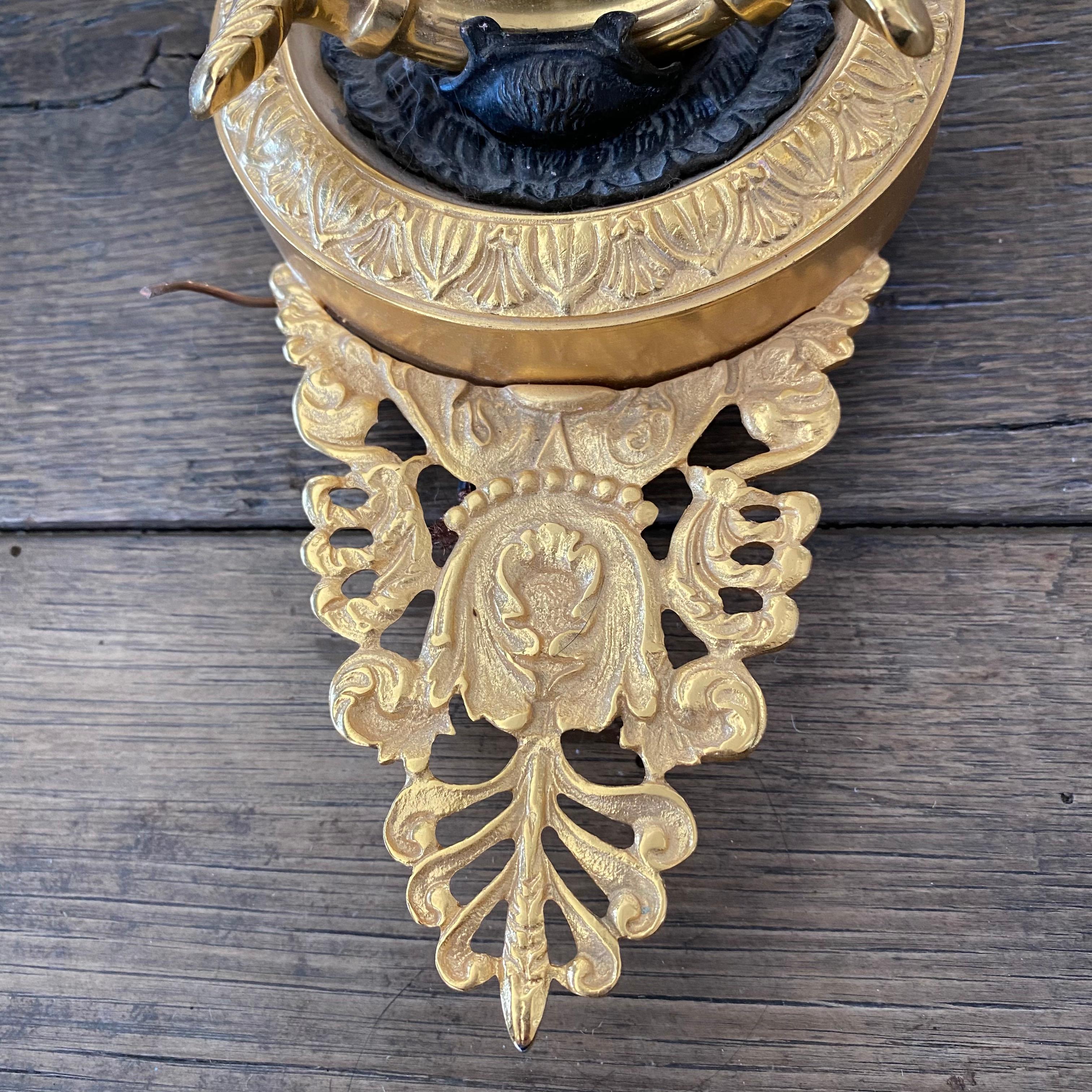 Elegant Pair of Two Arm French Empire Style Brass Wall Sconces with Lions Heads 3