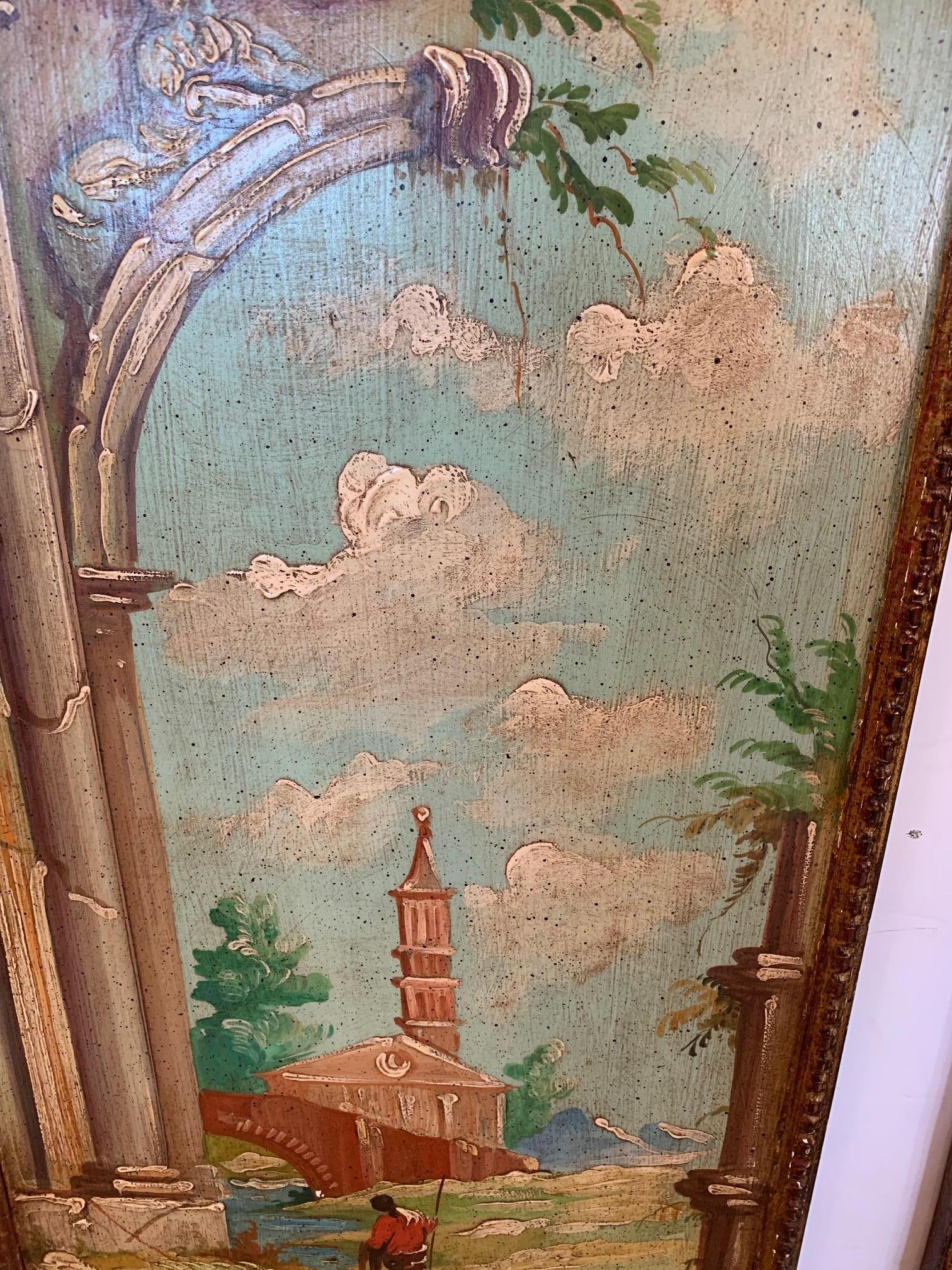 A marvelous pair of Venetian antique hand painted panels having gorgeous color palette with turquoise sky, puffy white clouds and romantic architectural remains that suggest a past glorious time in history. Frames are giltwood and scalloped shaped