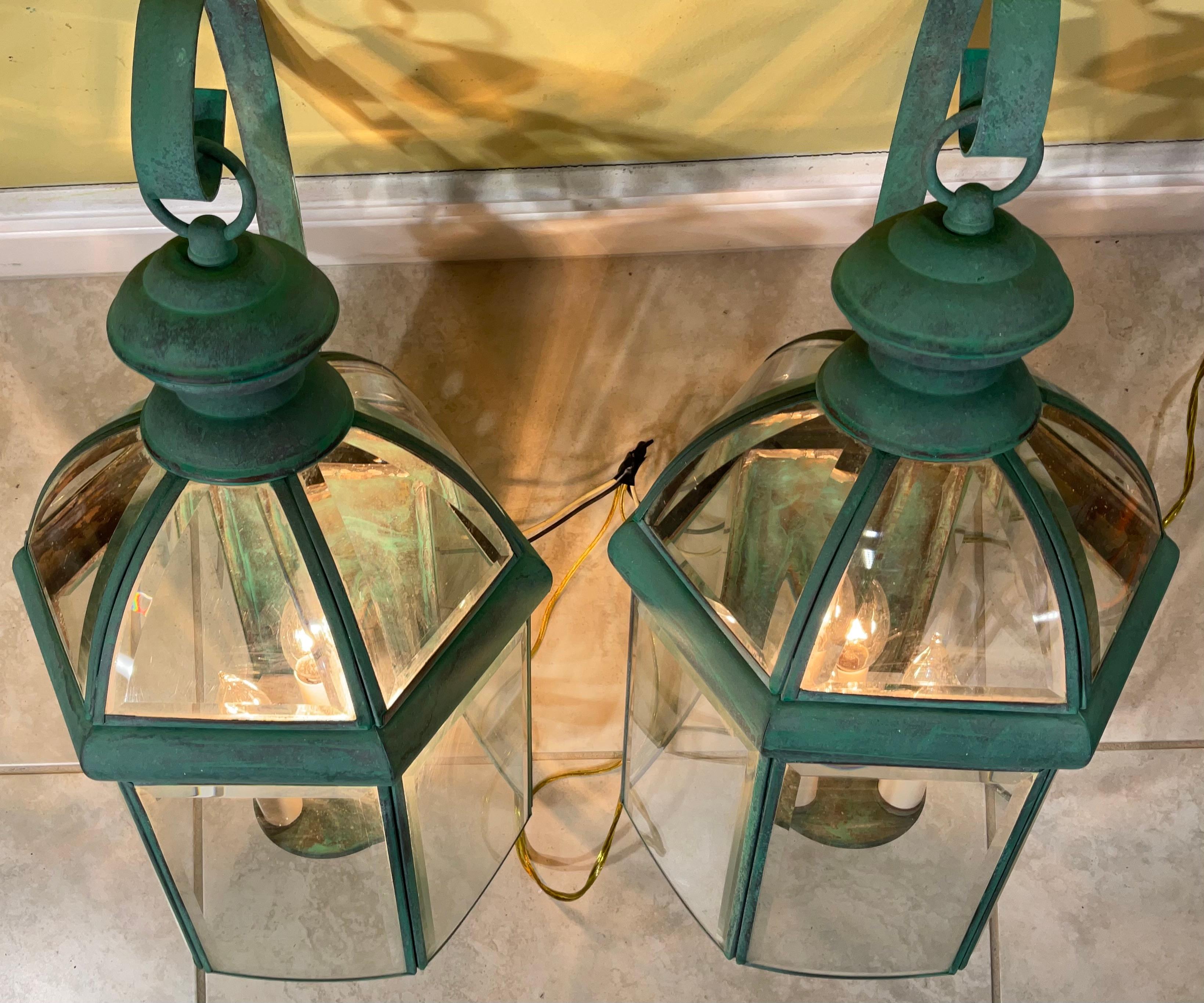

Add a touch of classic charm to your outdoor space with this pair of vintage brass lanterns. These meticulously crafted lanterns exude timeless elegance and are sure to become a focal point of your home's exterior.
Crafted from high-quality brass,