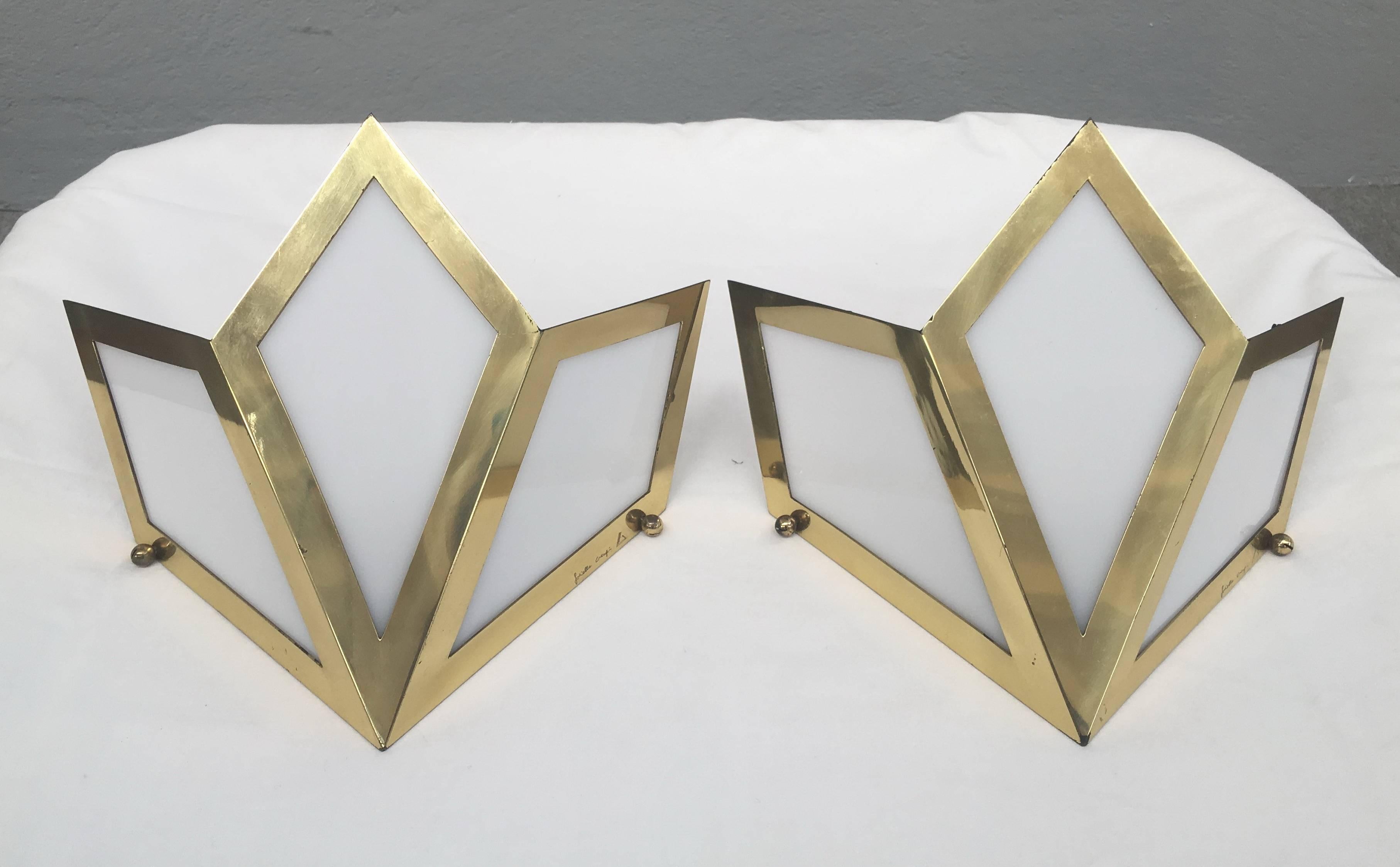 Brass and white Lucite sconces by Gabriella Crespi. Signed.