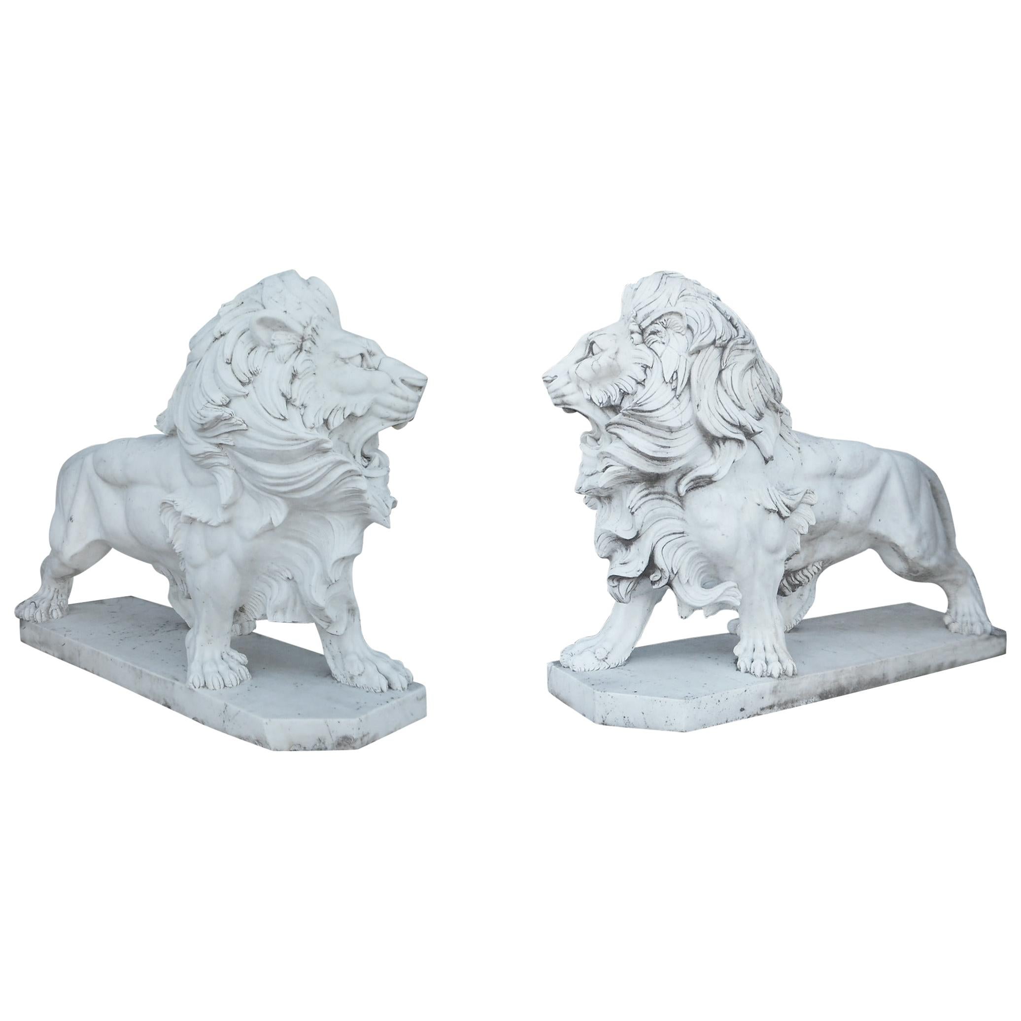 Elegant Pair of White Marble Lion Statues