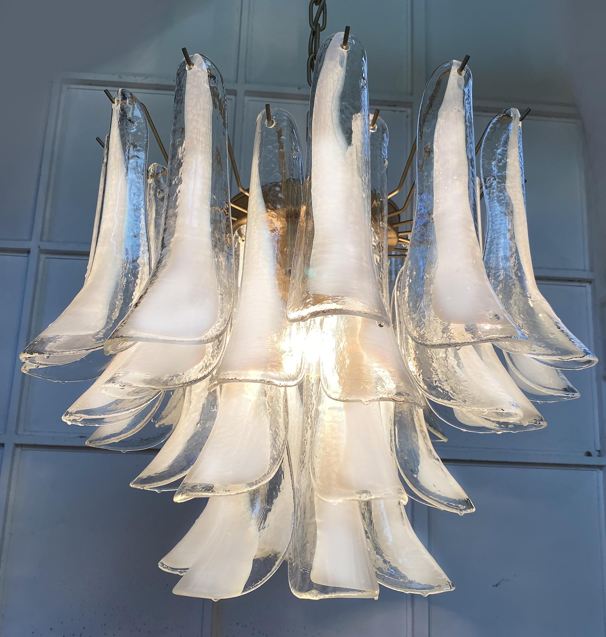 Elegant pair of chandeliers composed of 36 petals in precious murano glass, 1990s.
   