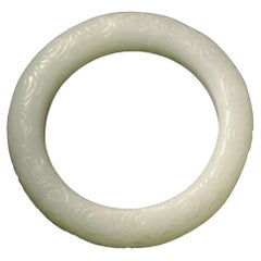 Elegant Pale Celadon White Jade Bangle with Cloud Motif