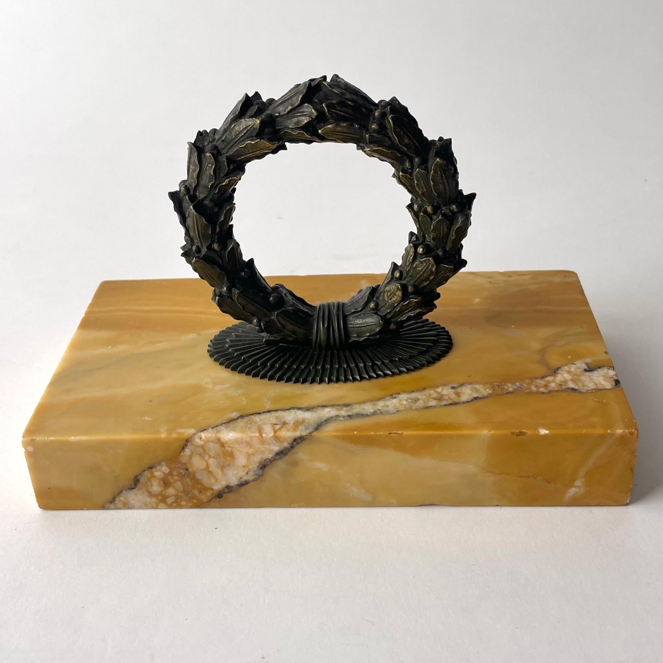 Elegant Paperweight in dark patinated bronze and marble. Empire, made during 1820s-1830s in Europe. Classic Laurel Wreath from the Empire Era.

Wear consistent with age and use 