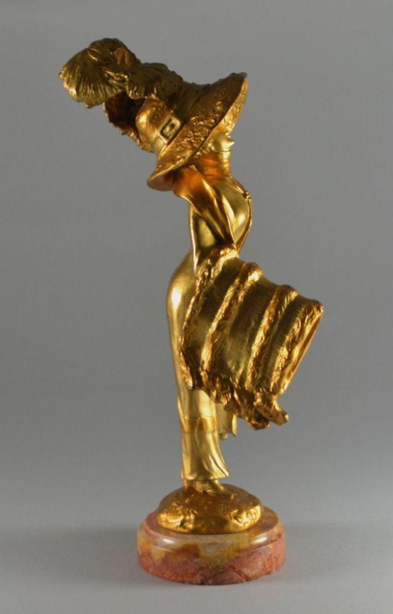 Georges Flamand (1895 - 1925)

Elegante au Chapeau. (Elegant woman with hat)

Gilded Bronze sculpture. Signed and dated 1911.
Excellent condition.

25.5 cm high