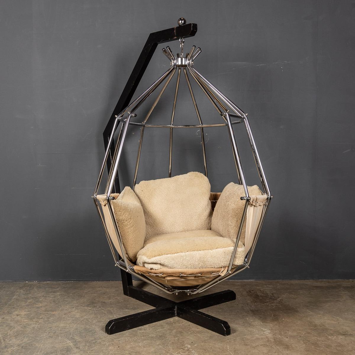 Iconic Swedish Ib Arberg design parrot cage chair, circa 1970-1980. Original cotton canvas upholstery, nickel-plated swing cage with a black enamel steel base.

Condition
In great condition - No Damage, wear consistent with age.

Size
Height: