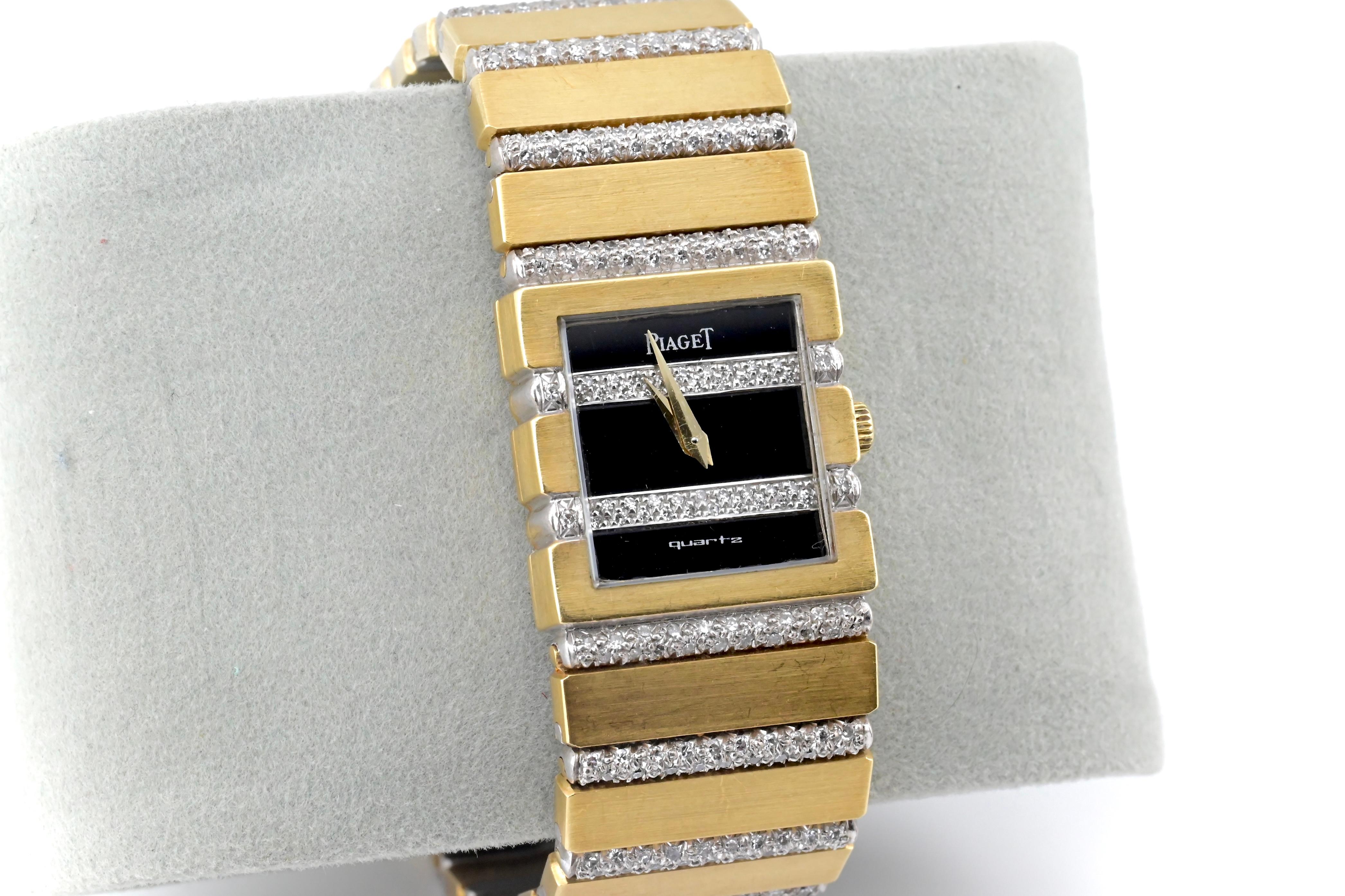 This is a stunning Piaget polo 18k solid yellow gold ladies wristwatch with a black diamond dial & diamonds encrusted in an alternating pattern with the strap. This watch weighs 102 grams, and is 6 6/8 inches in strap length. It has a 21mm diameter.