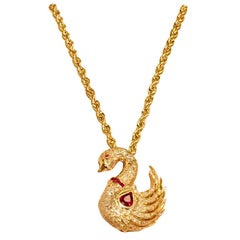 Elegant Pigeon Blood Red Ruby and Diamond Yellow Gold Swan Pendant or Brooch Pin