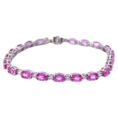 Elegante pulsera de piedras preciosas rosas